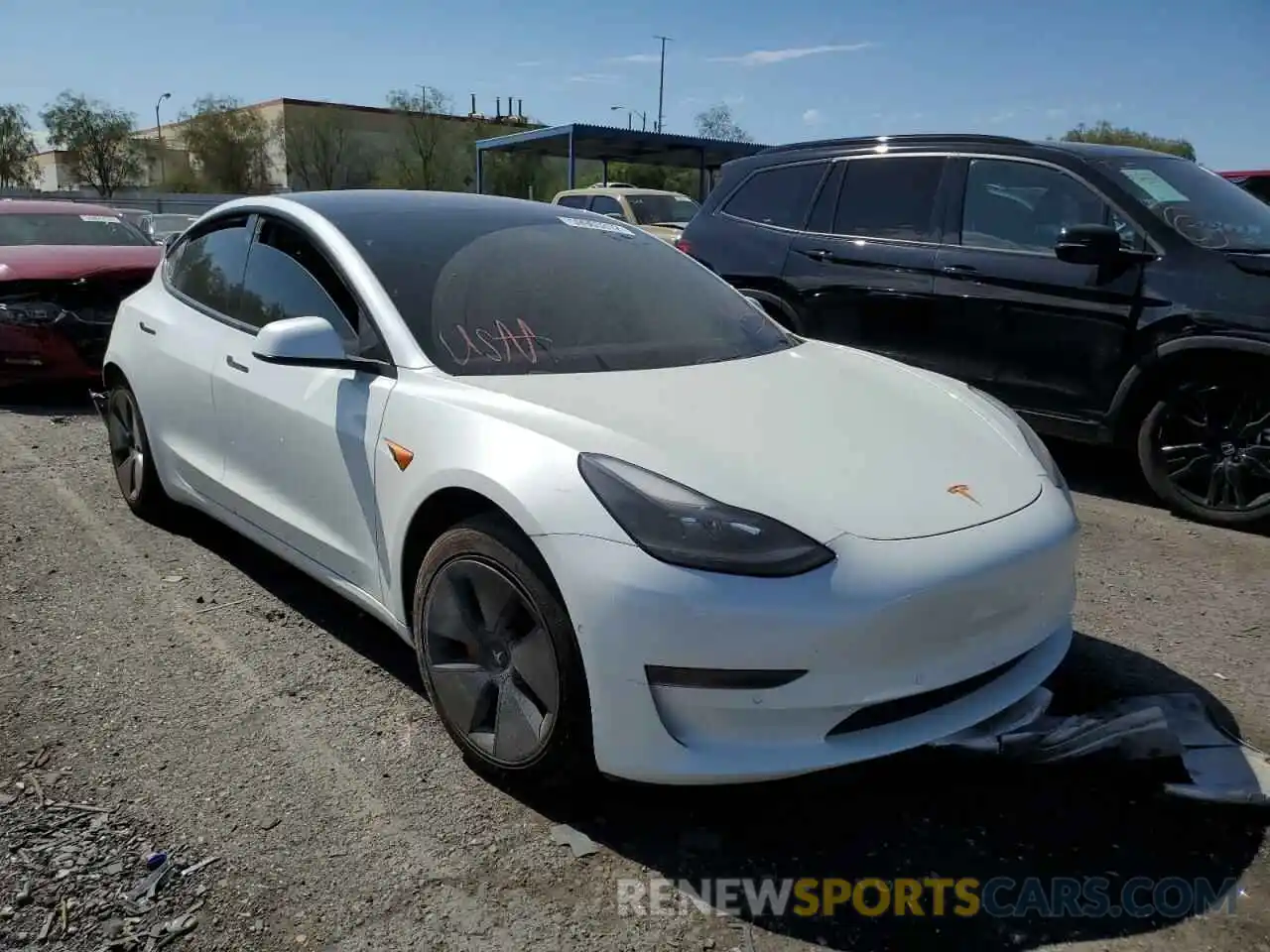 1 Photograph of a damaged car 5YJ3E1EA9MF929875 TESLA MODEL 3 2021