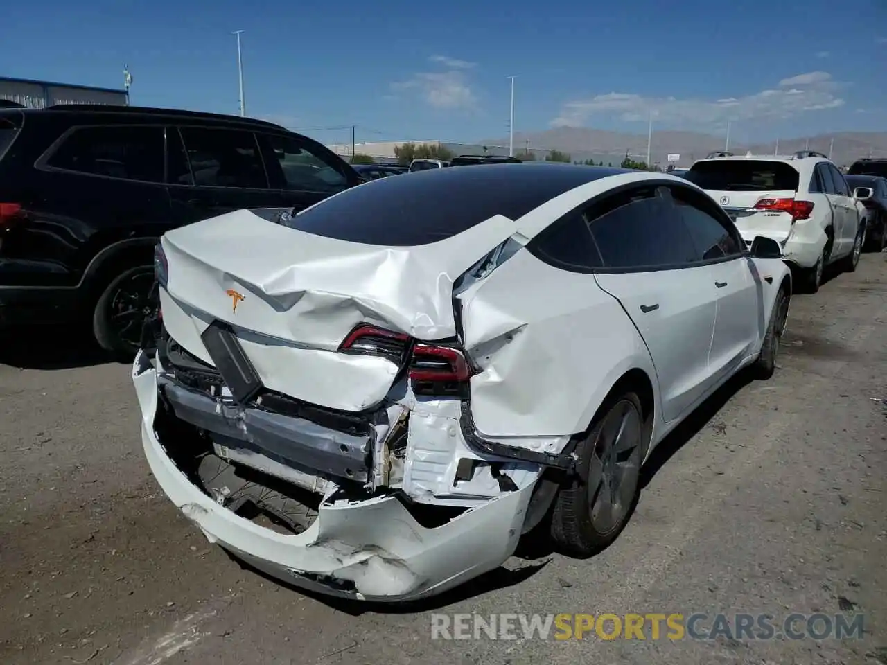 4 Photograph of a damaged car 5YJ3E1EA9MF929875 TESLA MODEL 3 2021