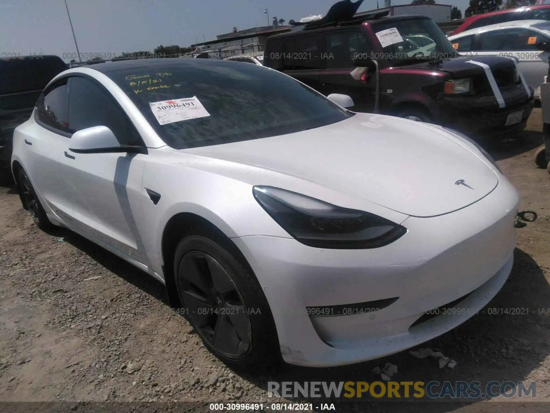 1 Photograph of a damaged car 5YJ3E1EA9MF943212 TESLA MODEL 3 2021