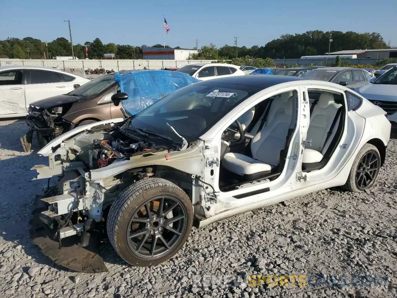 1 Photograph of a damaged car 5YJ3E1EA9MF987467 TESLA MODEL 3 2021