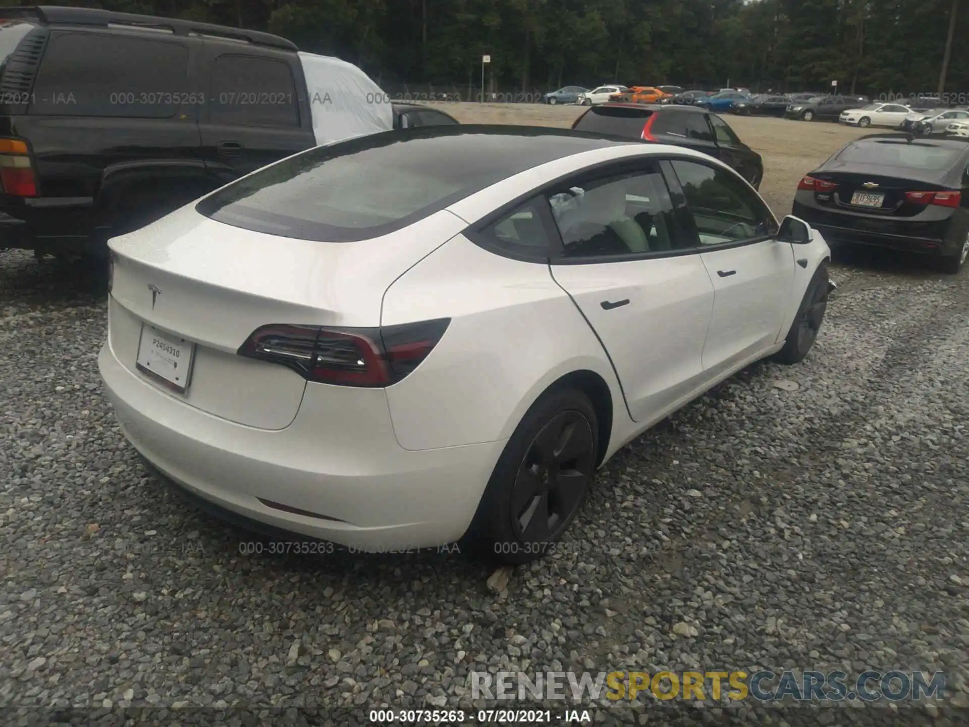 4 Photograph of a damaged car 5YJ3E1EA9MF987615 TESLA MODEL 3 2021