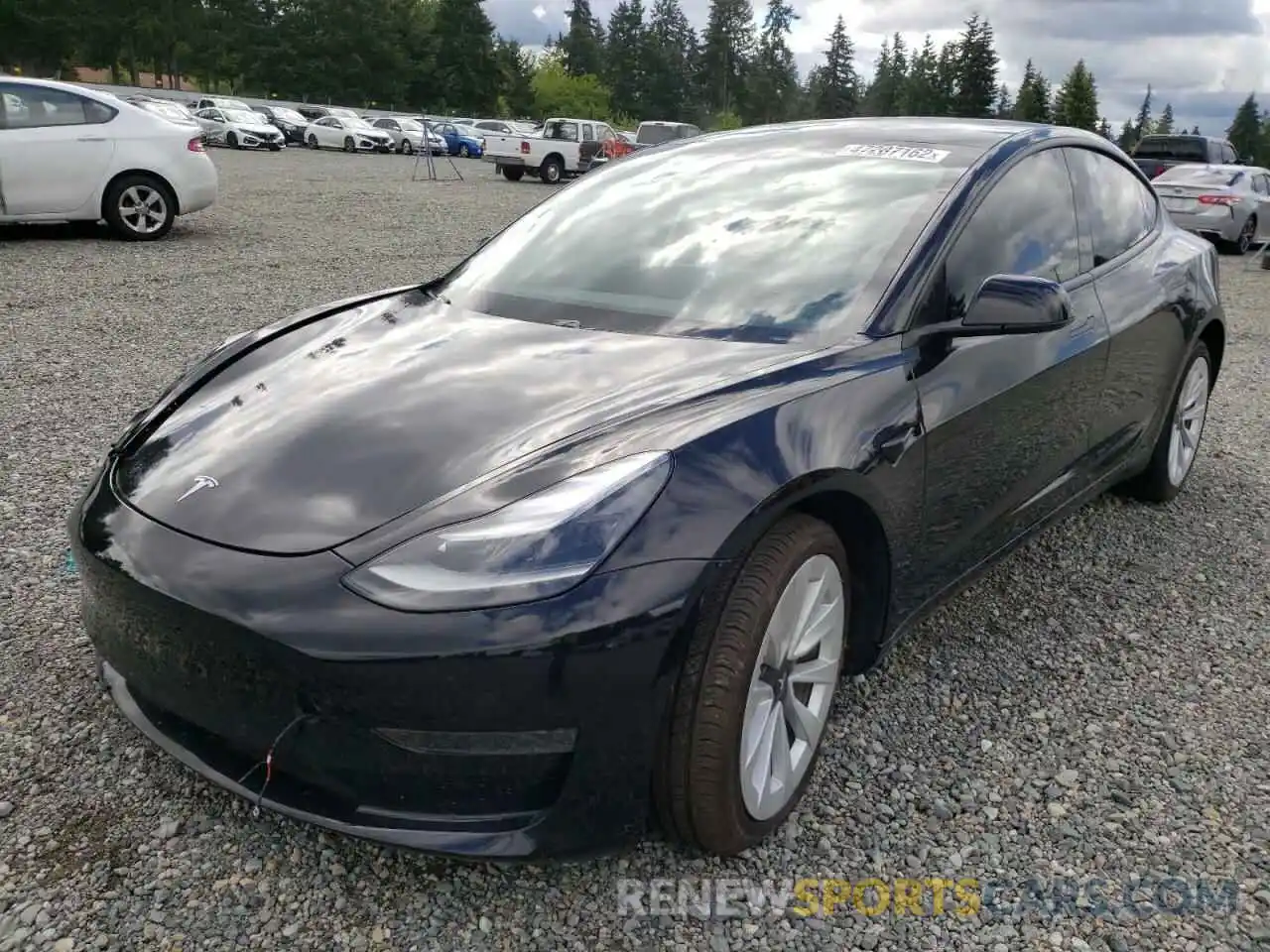 2 Photograph of a damaged car 5YJ3E1EA9MF995990 TESLA MODEL 3 2021