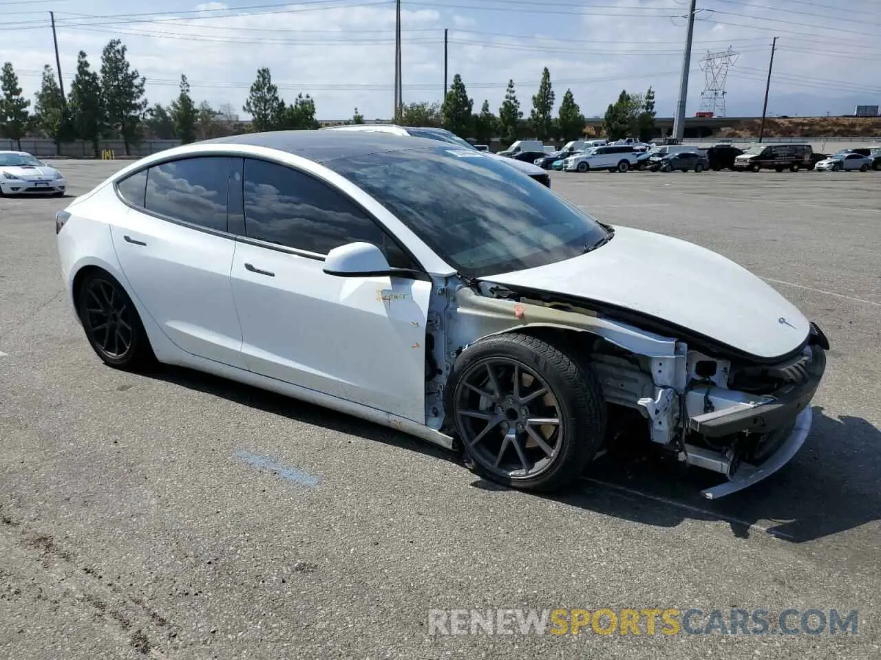 4 Photograph of a damaged car 5YJ3E1EAXMF028630 TESLA MODEL 3 2021