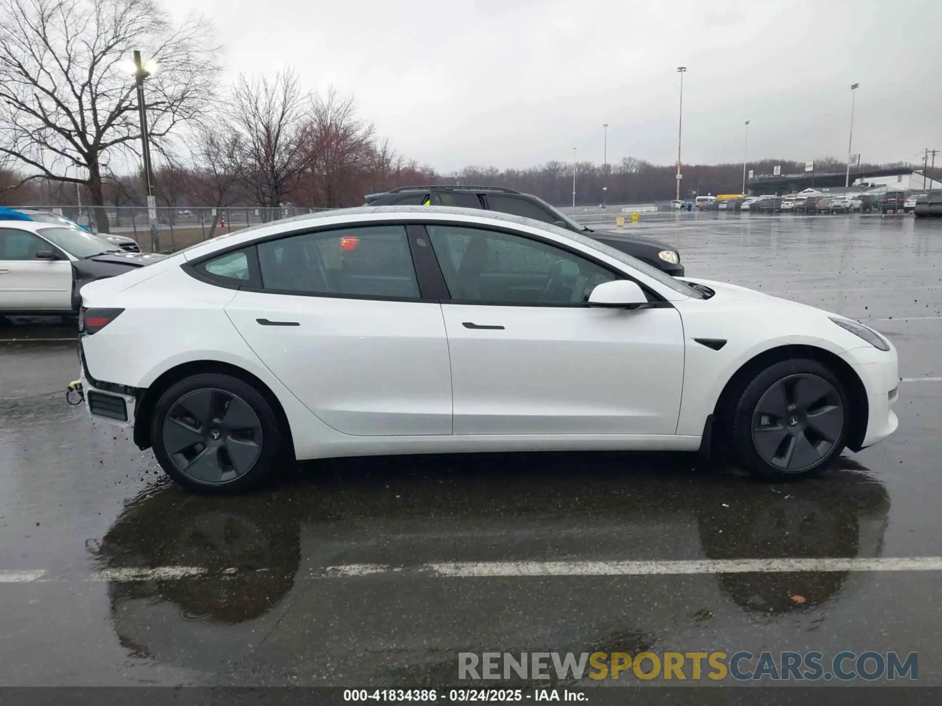 12 Photograph of a damaged car 5YJ3E1EAXMF052765 TESLA MODEL 3 2021