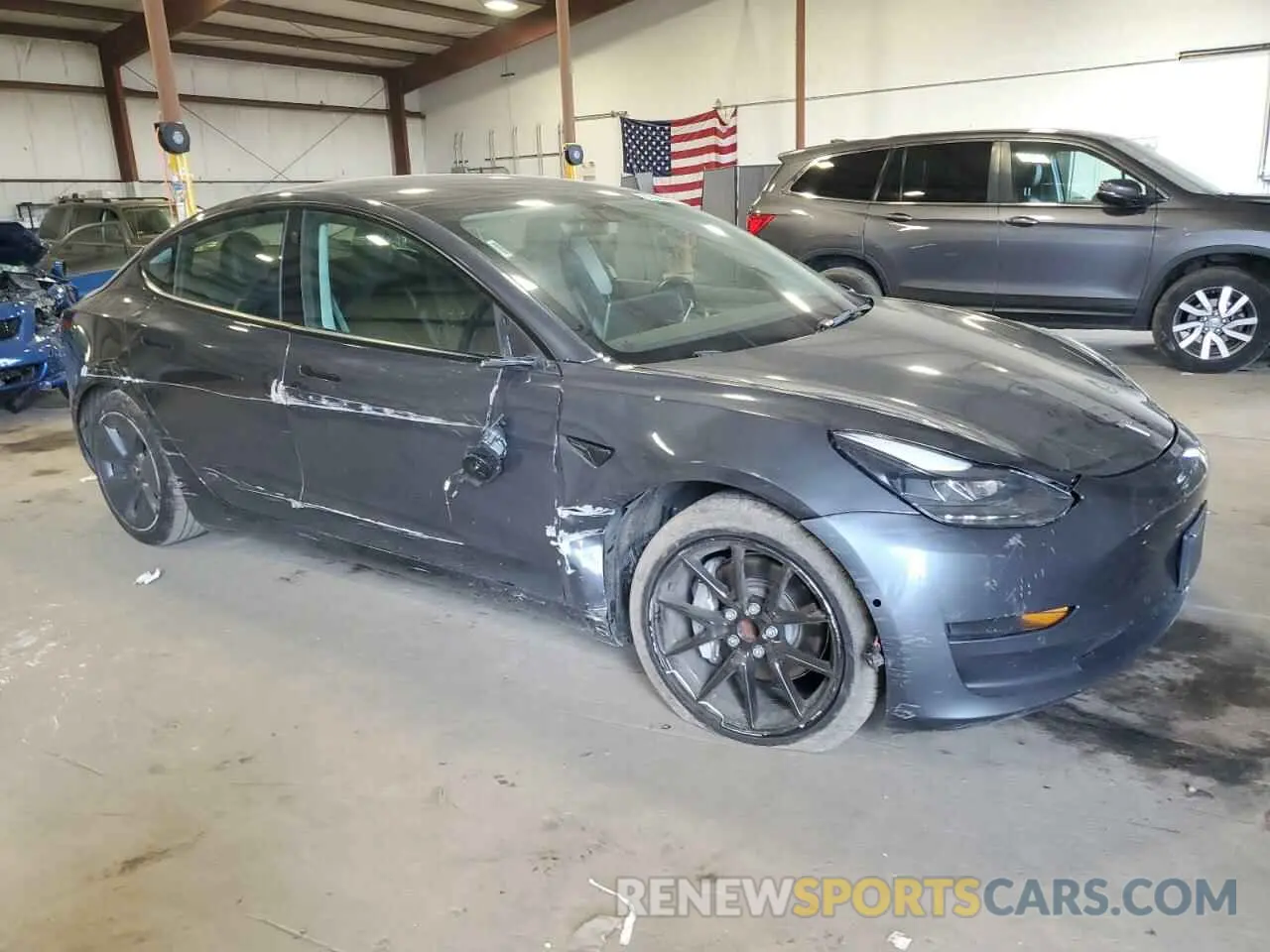 4 Photograph of a damaged car 5YJ3E1EAXMF086348 TESLA MODEL 3 2021