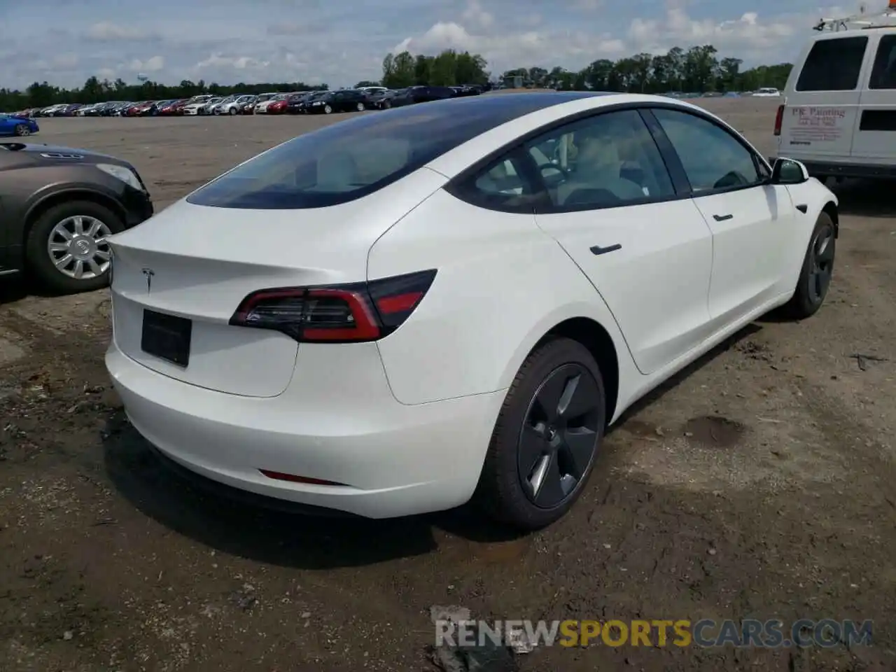 4 Photograph of a damaged car 5YJ3E1EAXMF099410 TESLA MODEL 3 2021