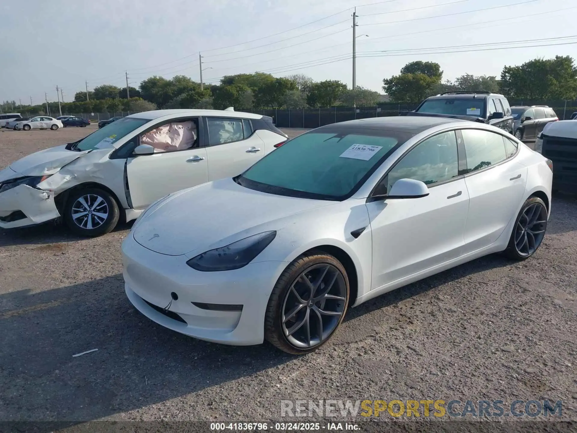 2 Photograph of a damaged car 5YJ3E1EAXMF908601 TESLA MODEL 3 2021