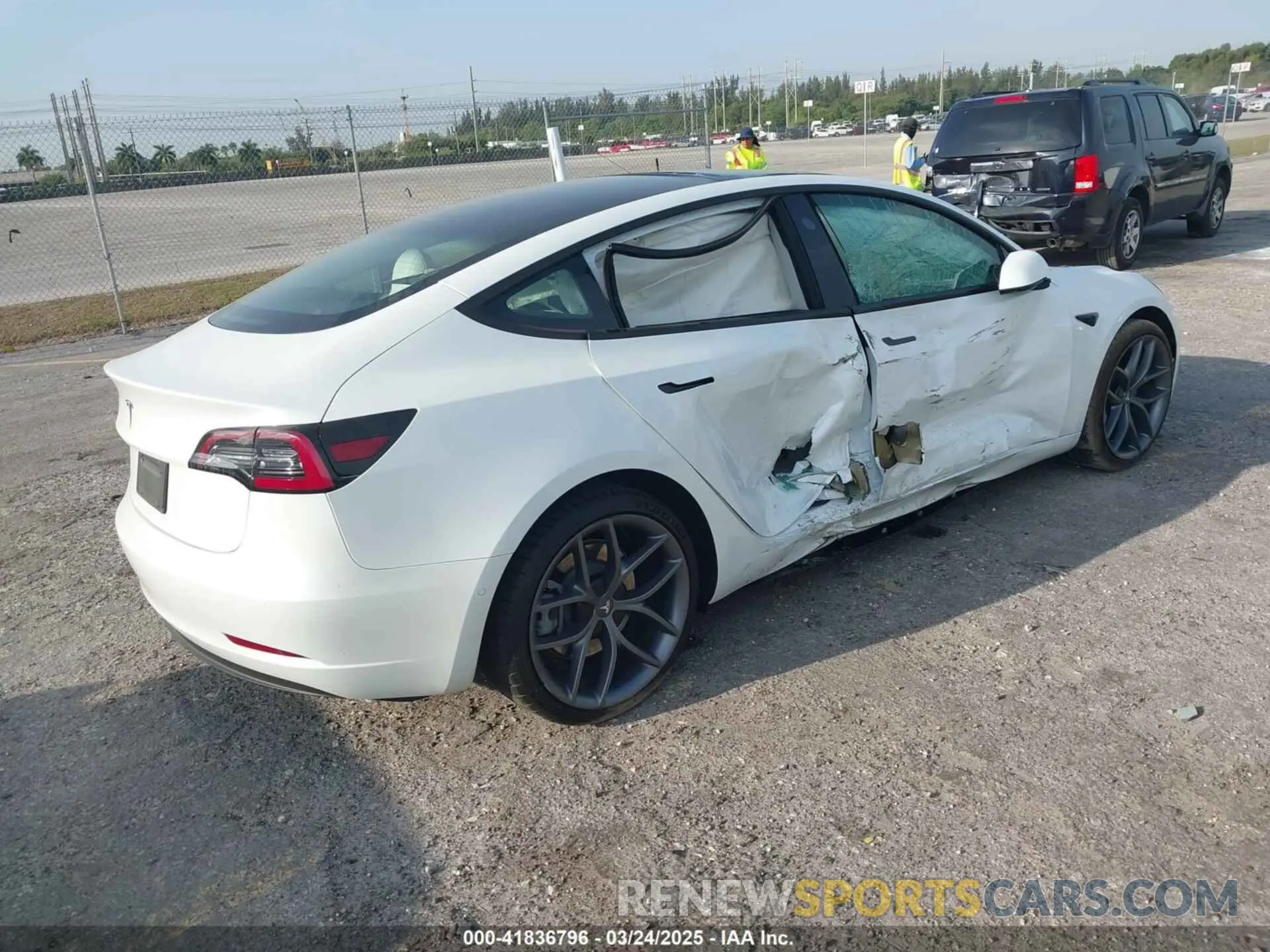 4 Photograph of a damaged car 5YJ3E1EAXMF908601 TESLA MODEL 3 2021
