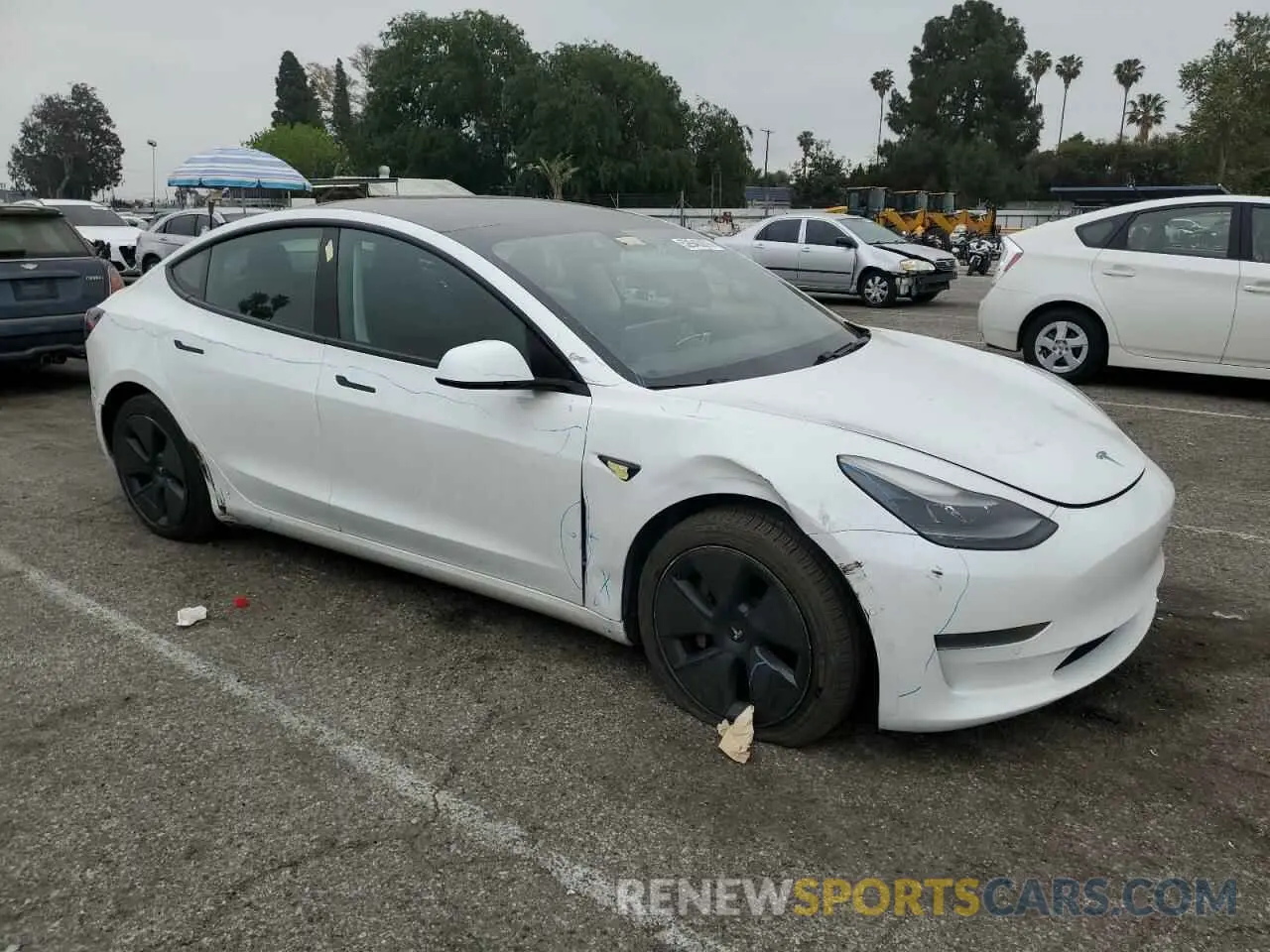 4 Photograph of a damaged car 5YJ3E1EAXMF940500 TESLA MODEL 3 2021