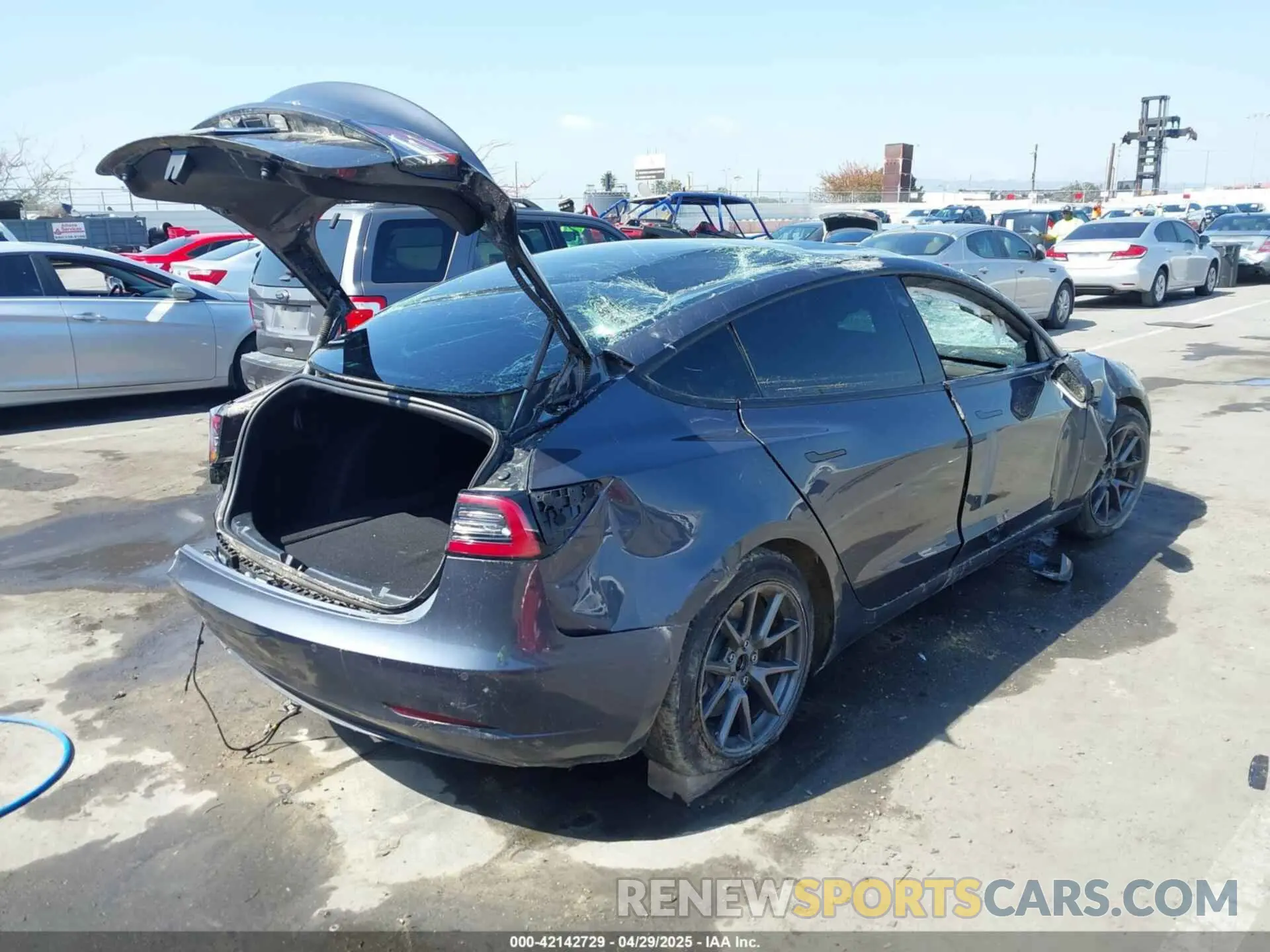 4 Photograph of a damaged car 5YJ3E1EAXMF982441 TESLA MODEL 3 2021