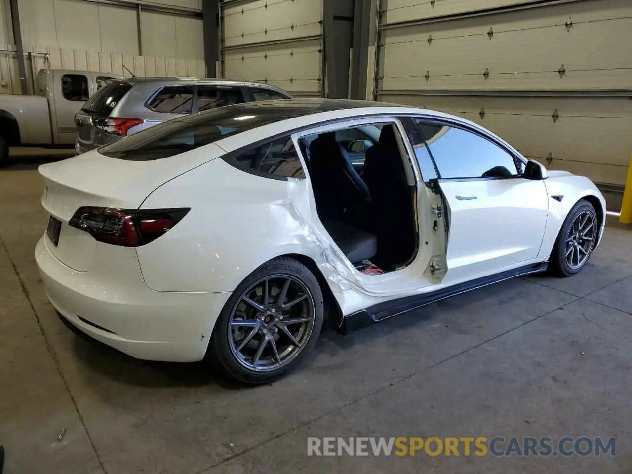 3 Photograph of a damaged car 5YJ3E1EAXMF991558 TESLA MODEL 3 2021