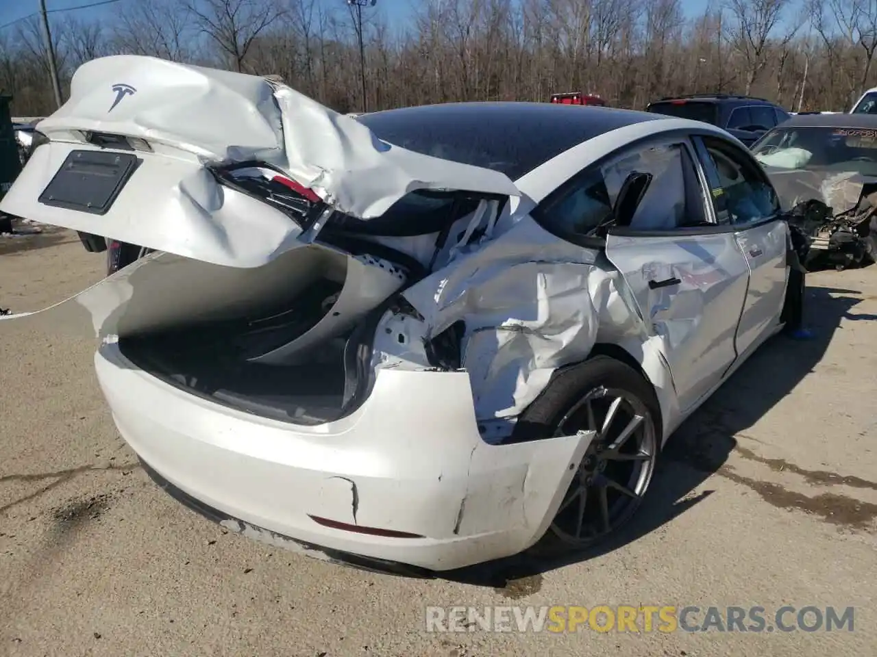 4 Photograph of a damaged car 5YJ3E1EAXMF996193 TESLA MODEL 3 2021