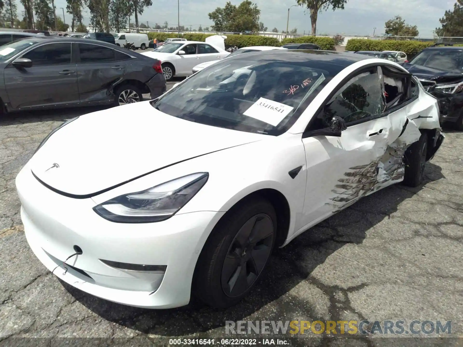 2 Photograph of a damaged car 5YJ3E1EB0MF003258 TESLA MODEL 3 2021