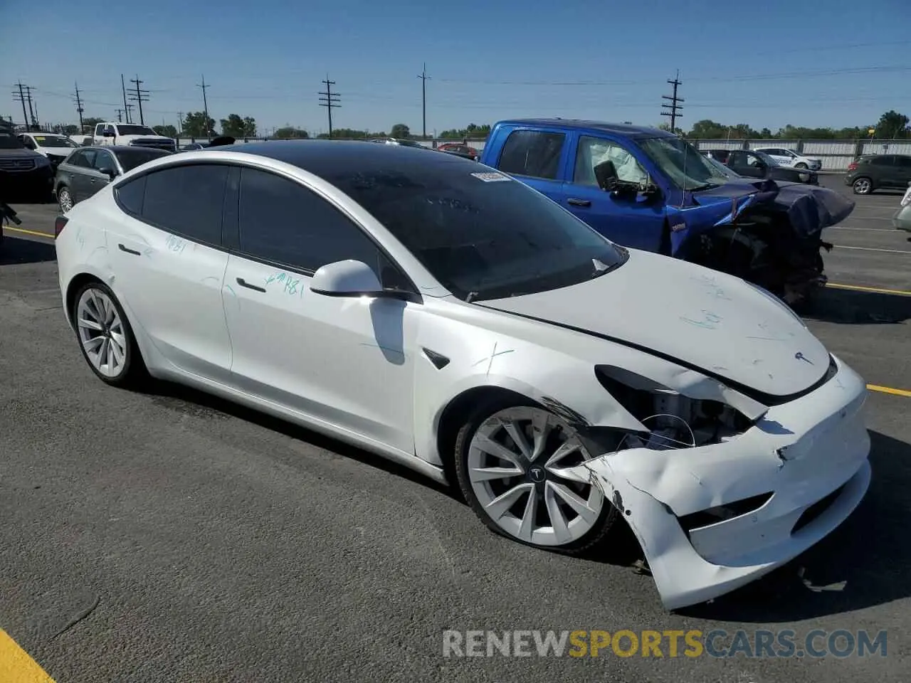 4 Photograph of a damaged car 5YJ3E1EB0MF050922 TESLA MODEL 3 2021
