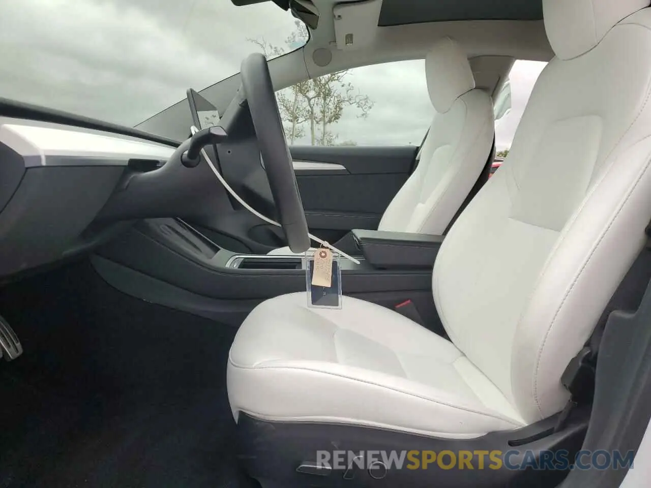 7 Photograph of a damaged car 5YJ3E1EB0MF073052 TESLA MODEL 3 2021