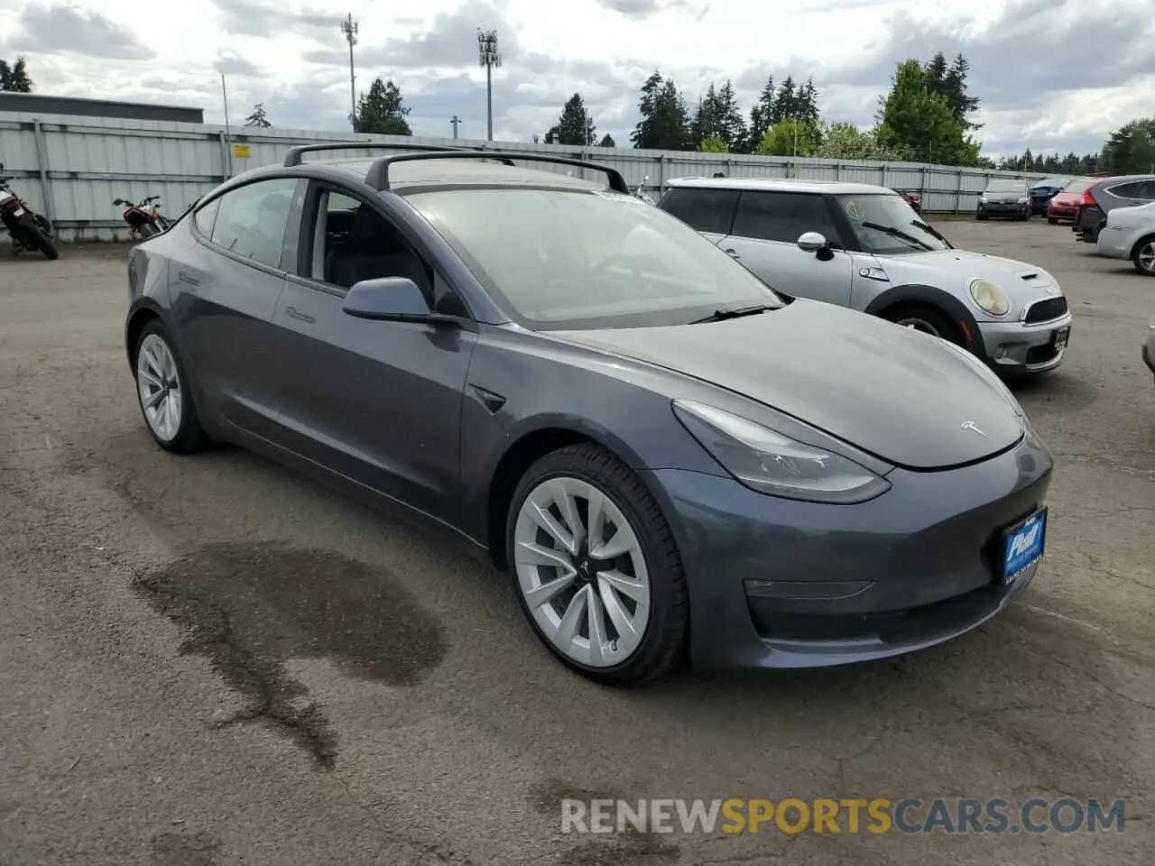 4 Photograph of a damaged car 5YJ3E1EB0MF936660 TESLA MODEL 3 2021