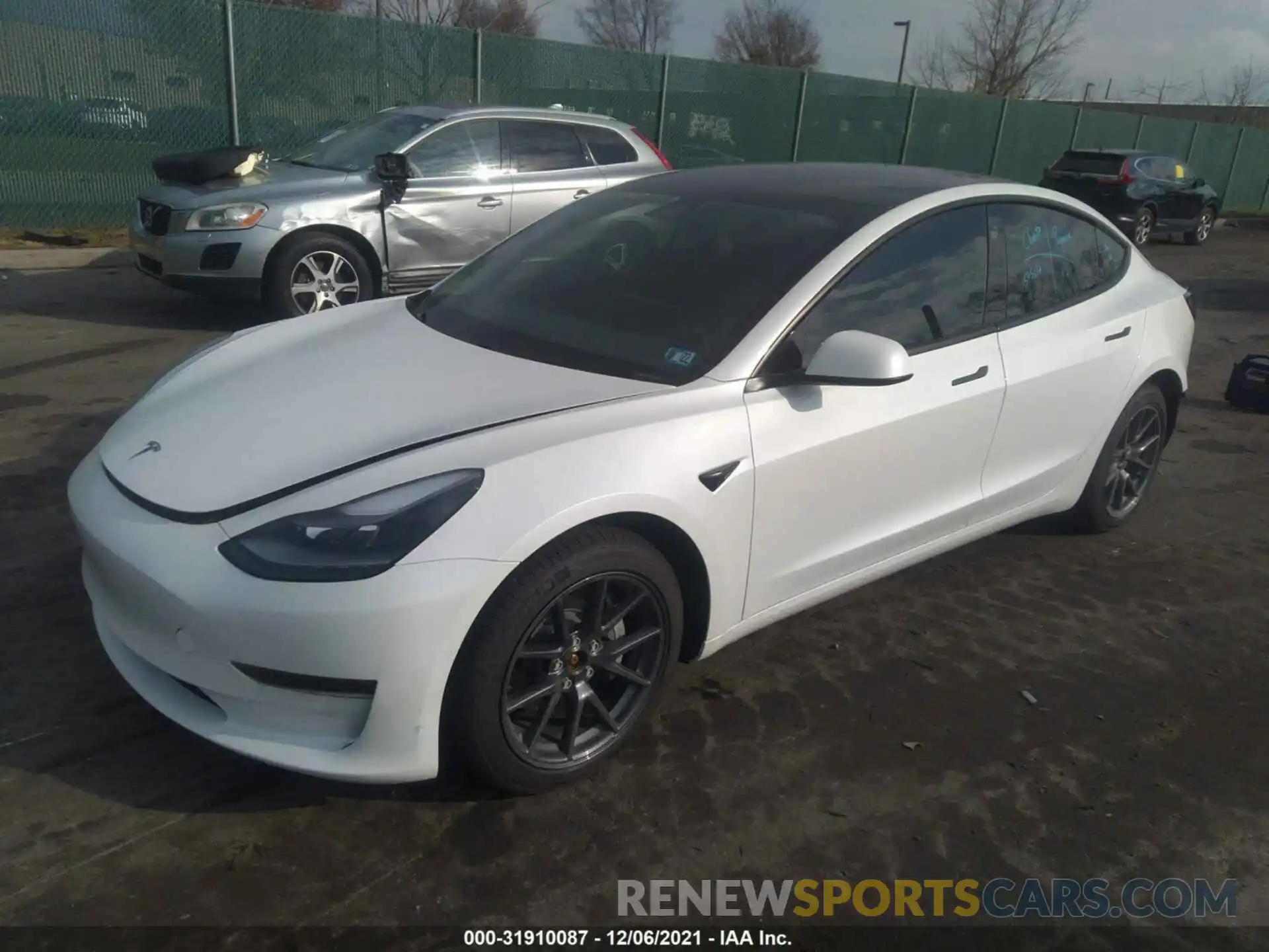 2 Photograph of a damaged car 5YJ3E1EB0MF984207 TESLA MODEL 3 2021