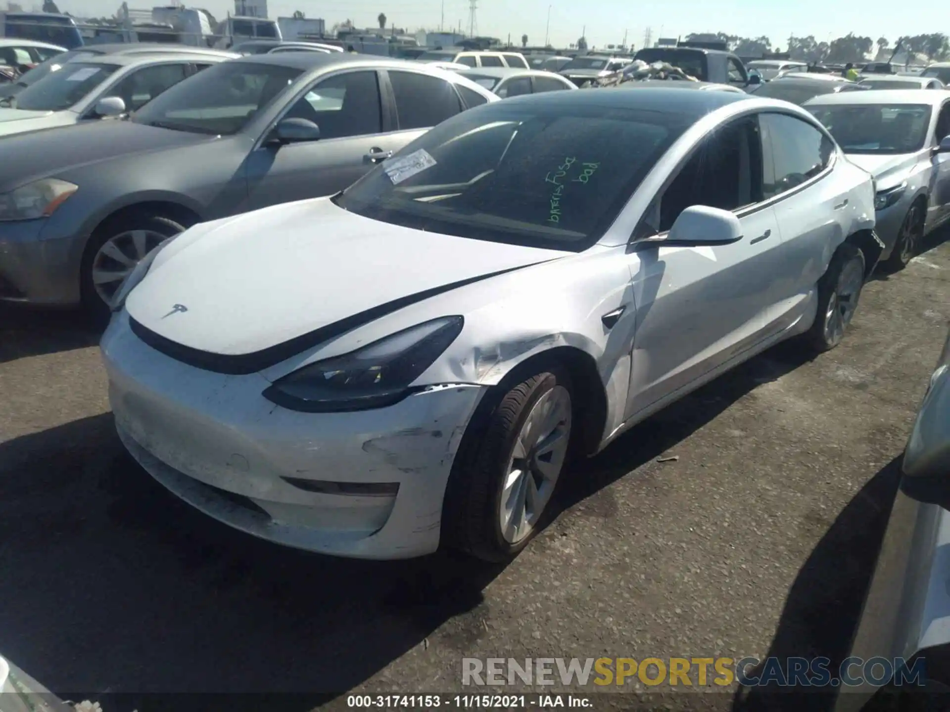 2 Photograph of a damaged car 5YJ3E1EB0MF990525 TESLA MODEL 3 2021