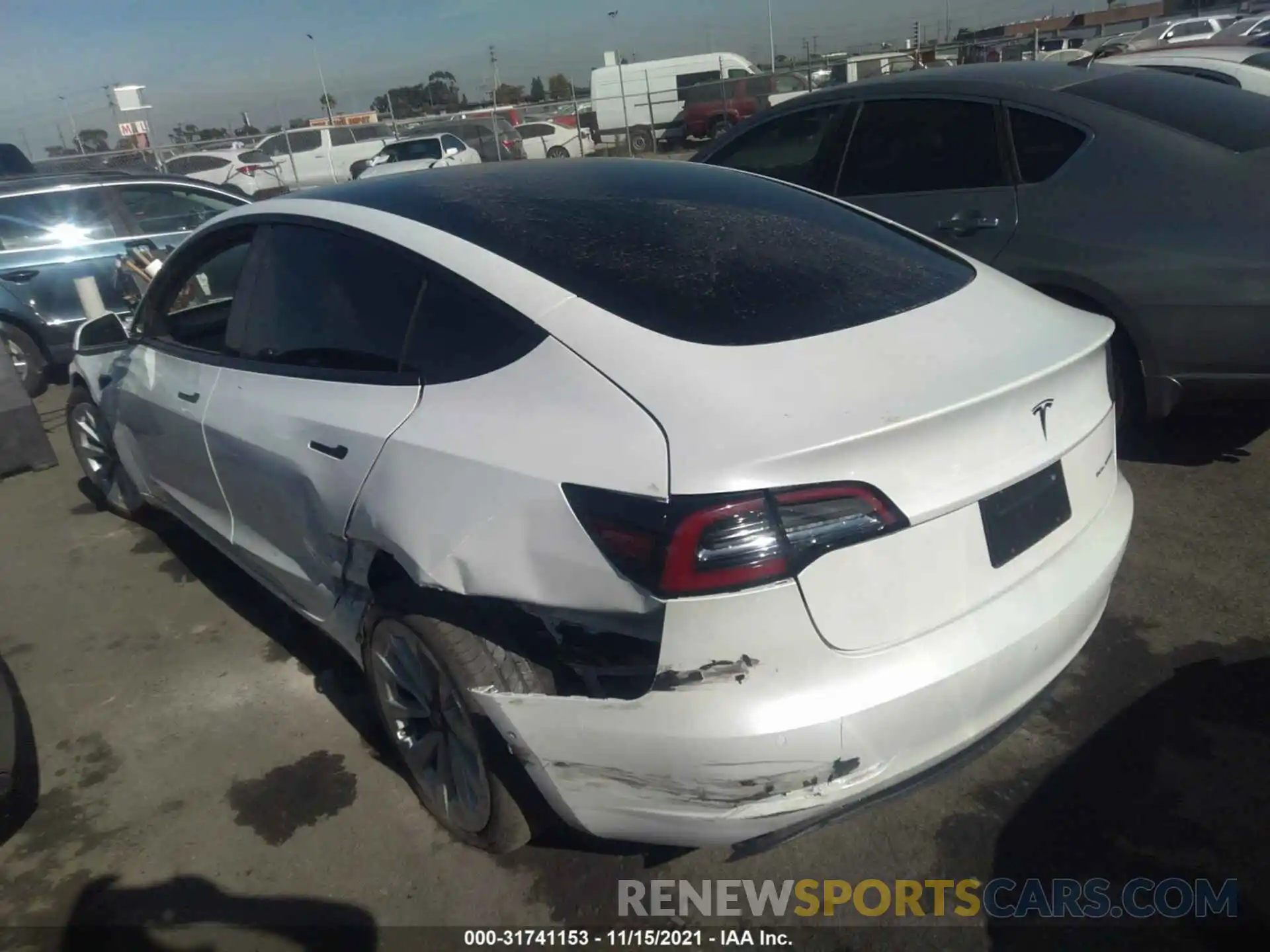 3 Photograph of a damaged car 5YJ3E1EB0MF990525 TESLA MODEL 3 2021