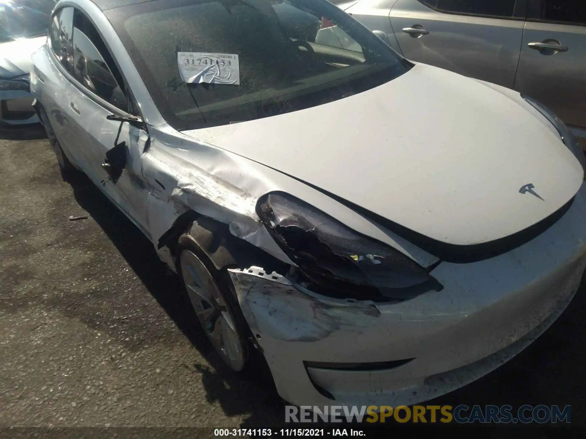 6 Photograph of a damaged car 5YJ3E1EB0MF990525 TESLA MODEL 3 2021