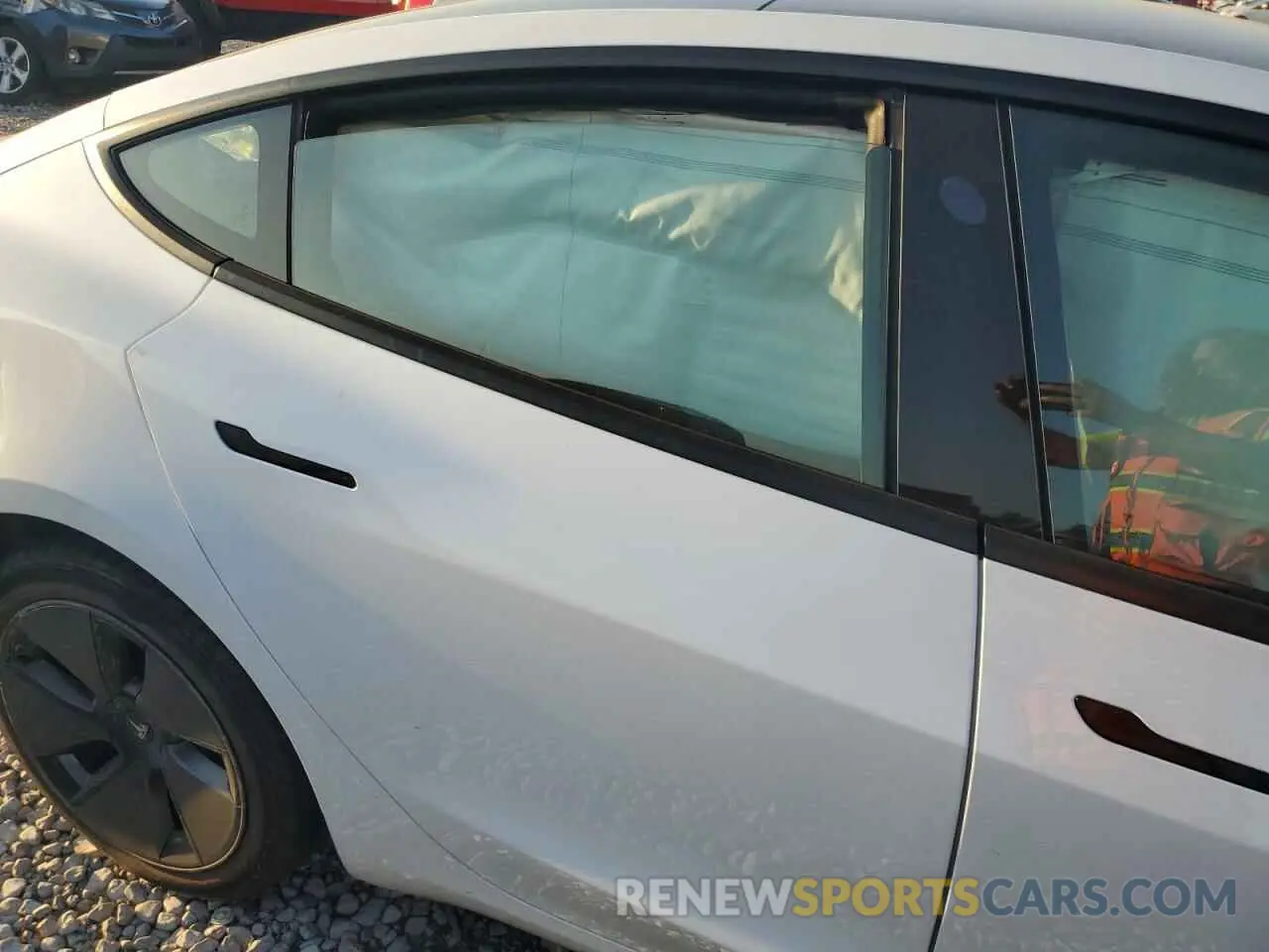 10 Photograph of a damaged car 5YJ3E1EB0MF992310 TESLA MODEL 3 2021