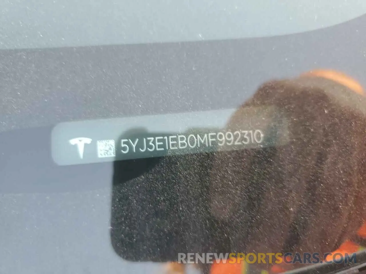 12 Photograph of a damaged car 5YJ3E1EB0MF992310 TESLA MODEL 3 2021