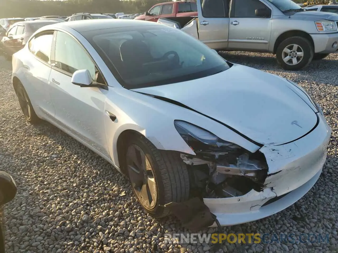 4 Photograph of a damaged car 5YJ3E1EB0MF992310 TESLA MODEL 3 2021