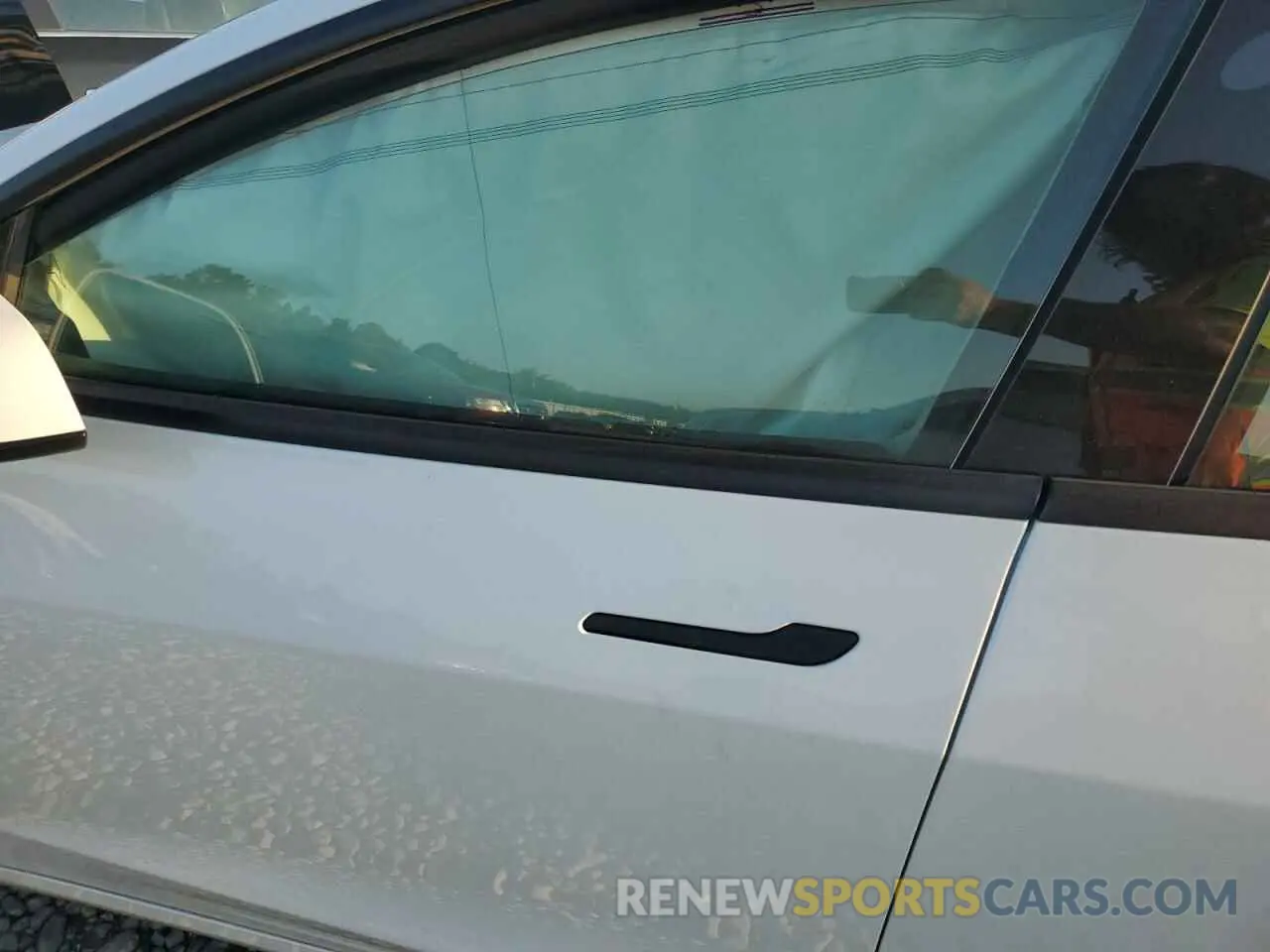 7 Photograph of a damaged car 5YJ3E1EB0MF992310 TESLA MODEL 3 2021