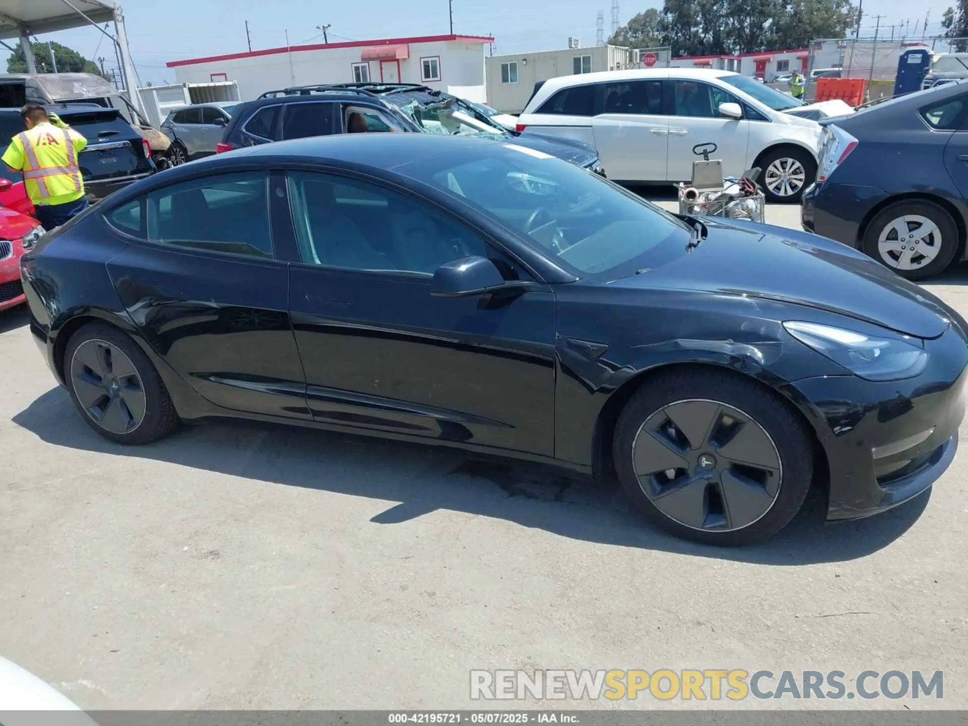 12 Photograph of a damaged car 5YJ3E1EB0MF995790 TESLA MODEL 3 2021