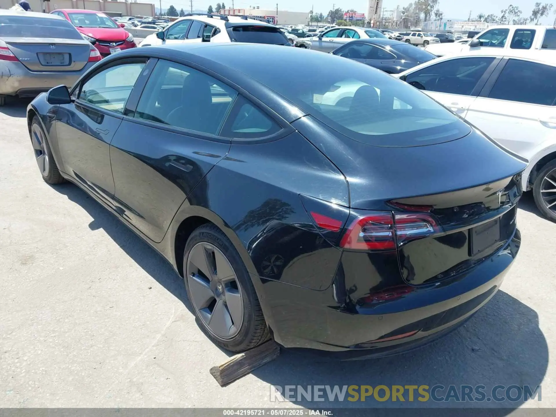 3 Photograph of a damaged car 5YJ3E1EB0MF995790 TESLA MODEL 3 2021