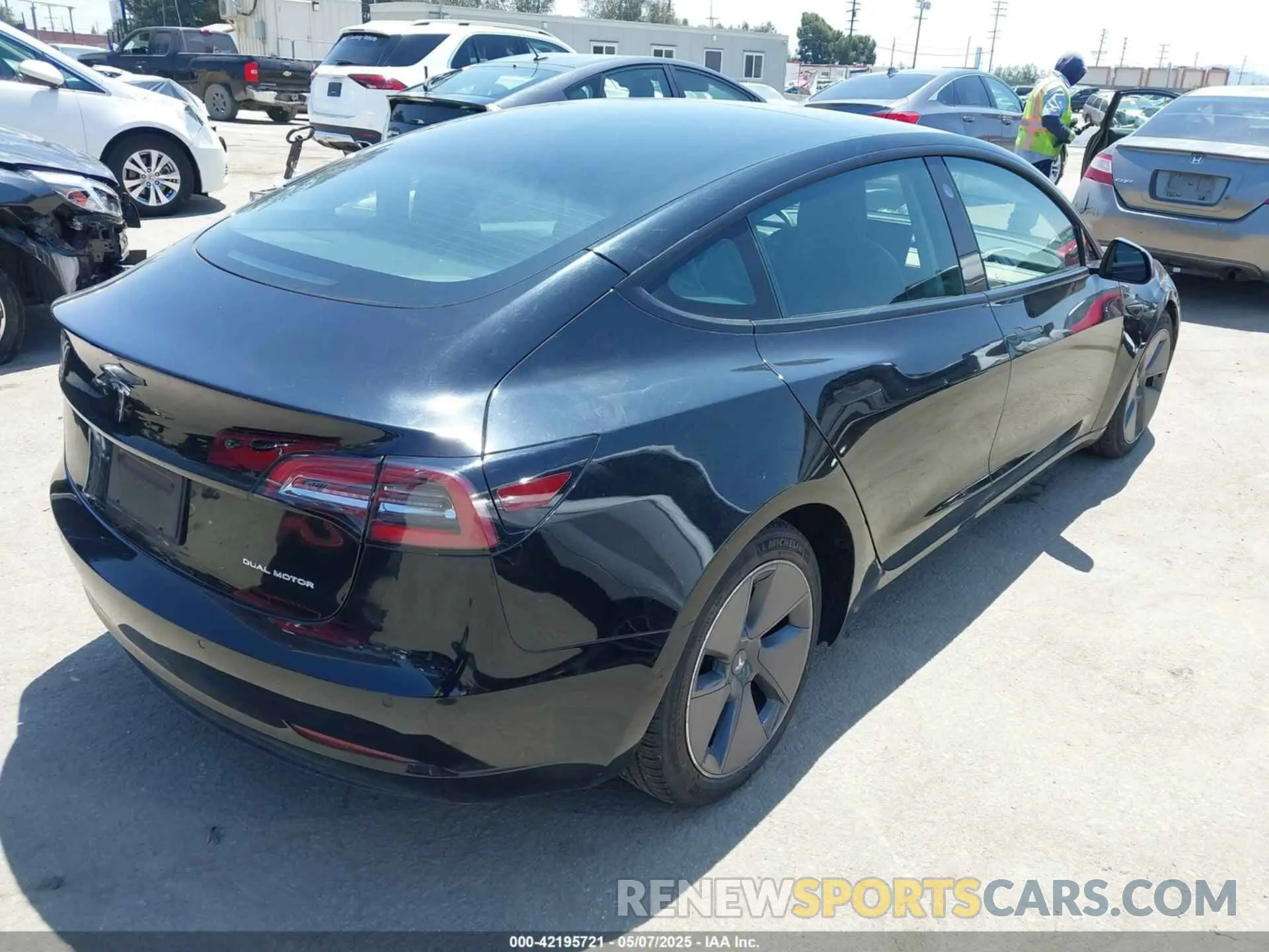 4 Photograph of a damaged car 5YJ3E1EB0MF995790 TESLA MODEL 3 2021