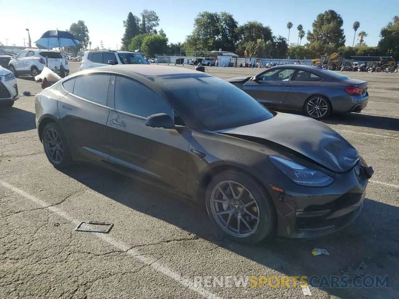 4 Photograph of a damaged car 5YJ3E1EB0MF998107 TESLA MODEL 3 2021