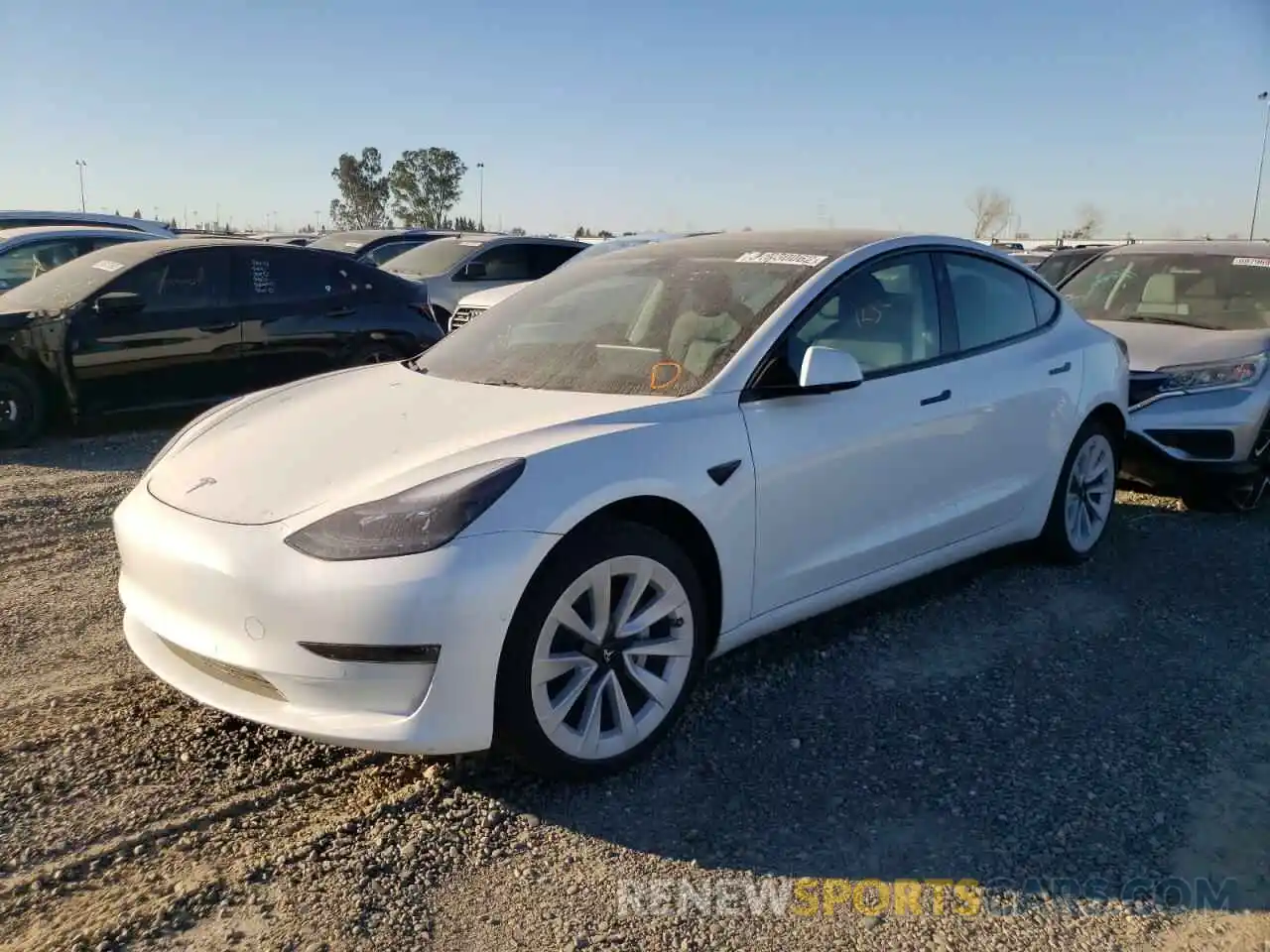 2 Photograph of a damaged car 5YJ3E1EB1MF056096 TESLA MODEL 3 2021