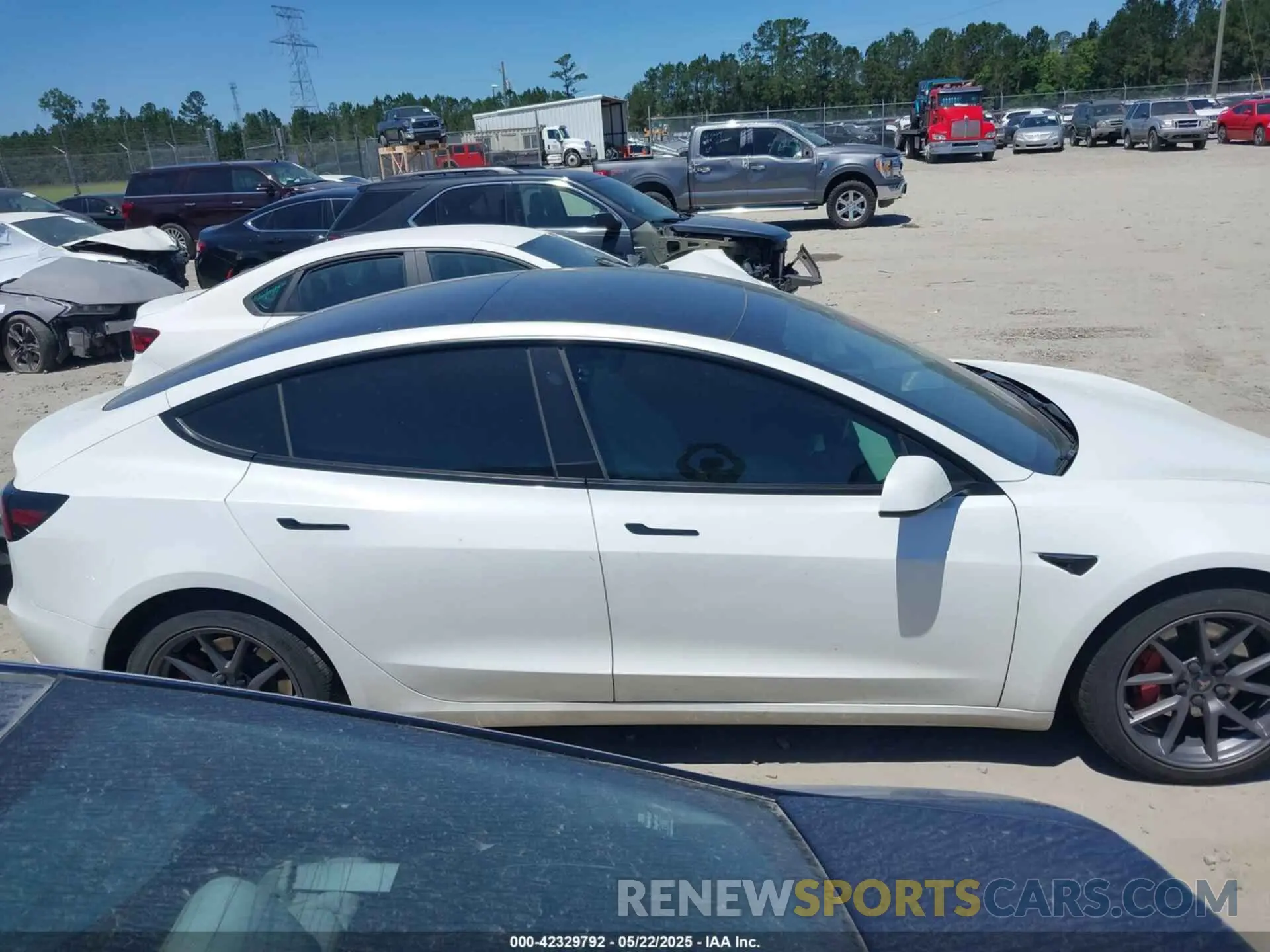 12 Photograph of a damaged car 5YJ3E1EB1MF062710 TESLA MODEL 3 2021
