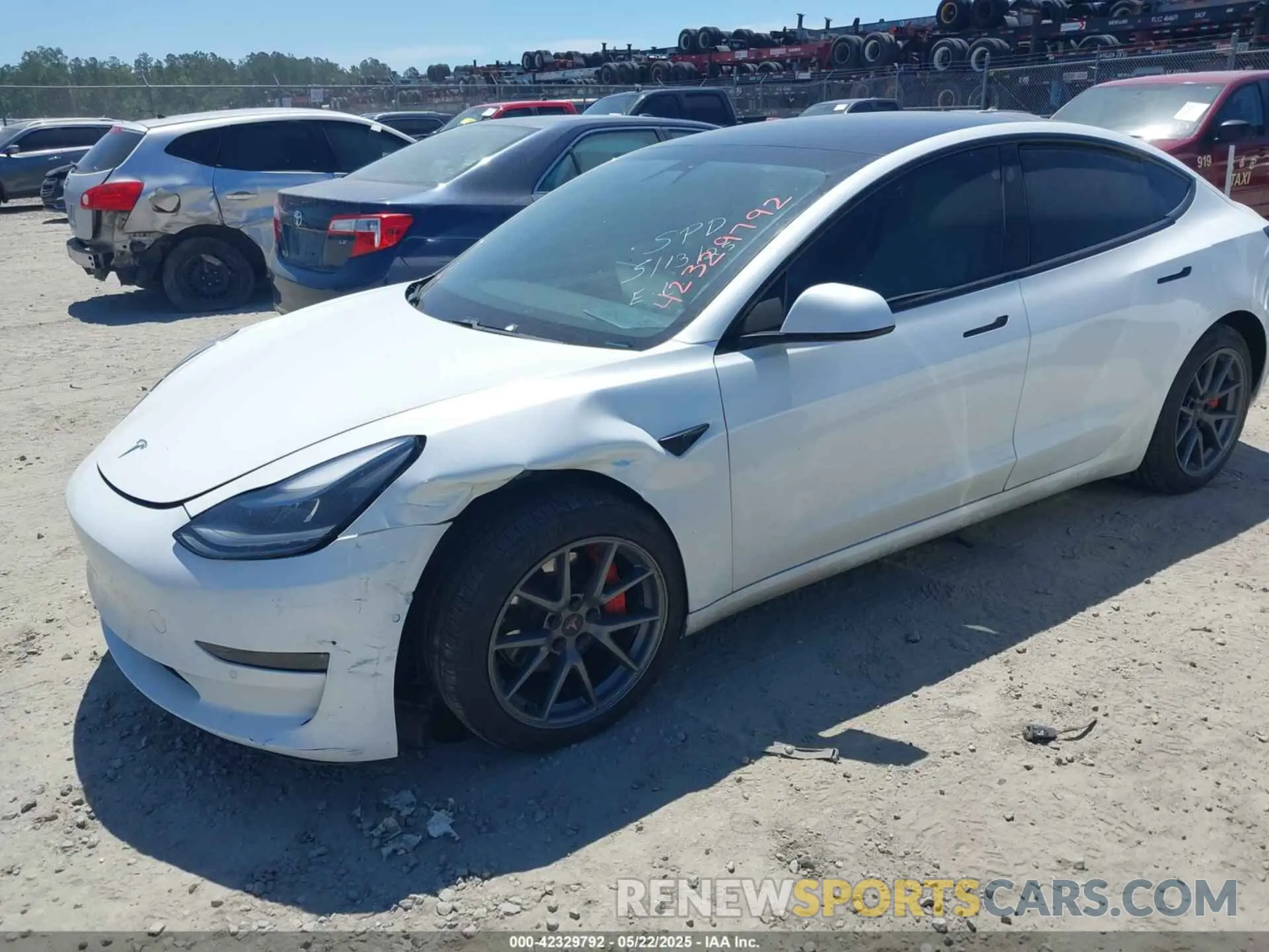 2 Photograph of a damaged car 5YJ3E1EB1MF062710 TESLA MODEL 3 2021