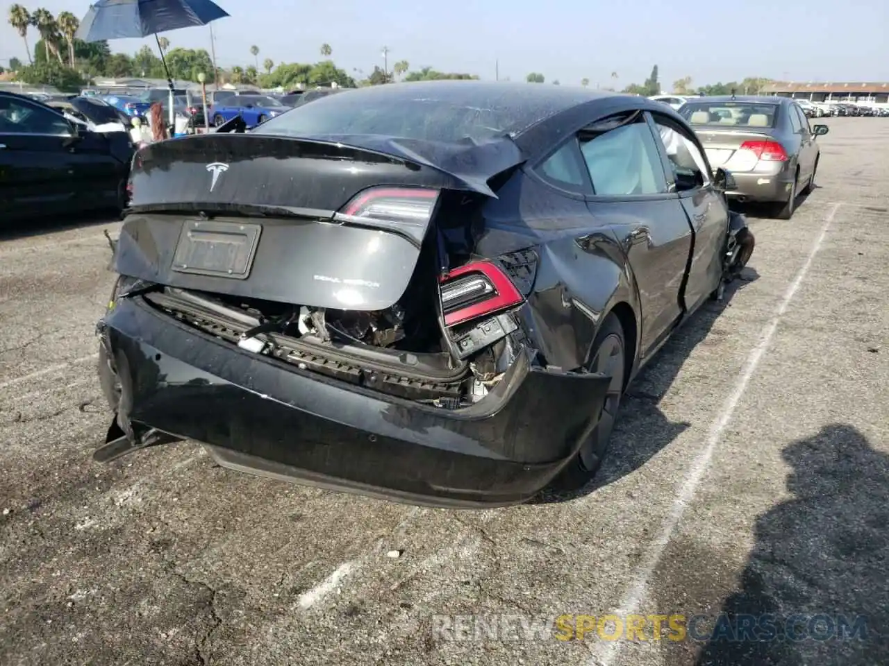 4 Photograph of a damaged car 5YJ3E1EB1MF073366 TESLA MODEL 3 2021