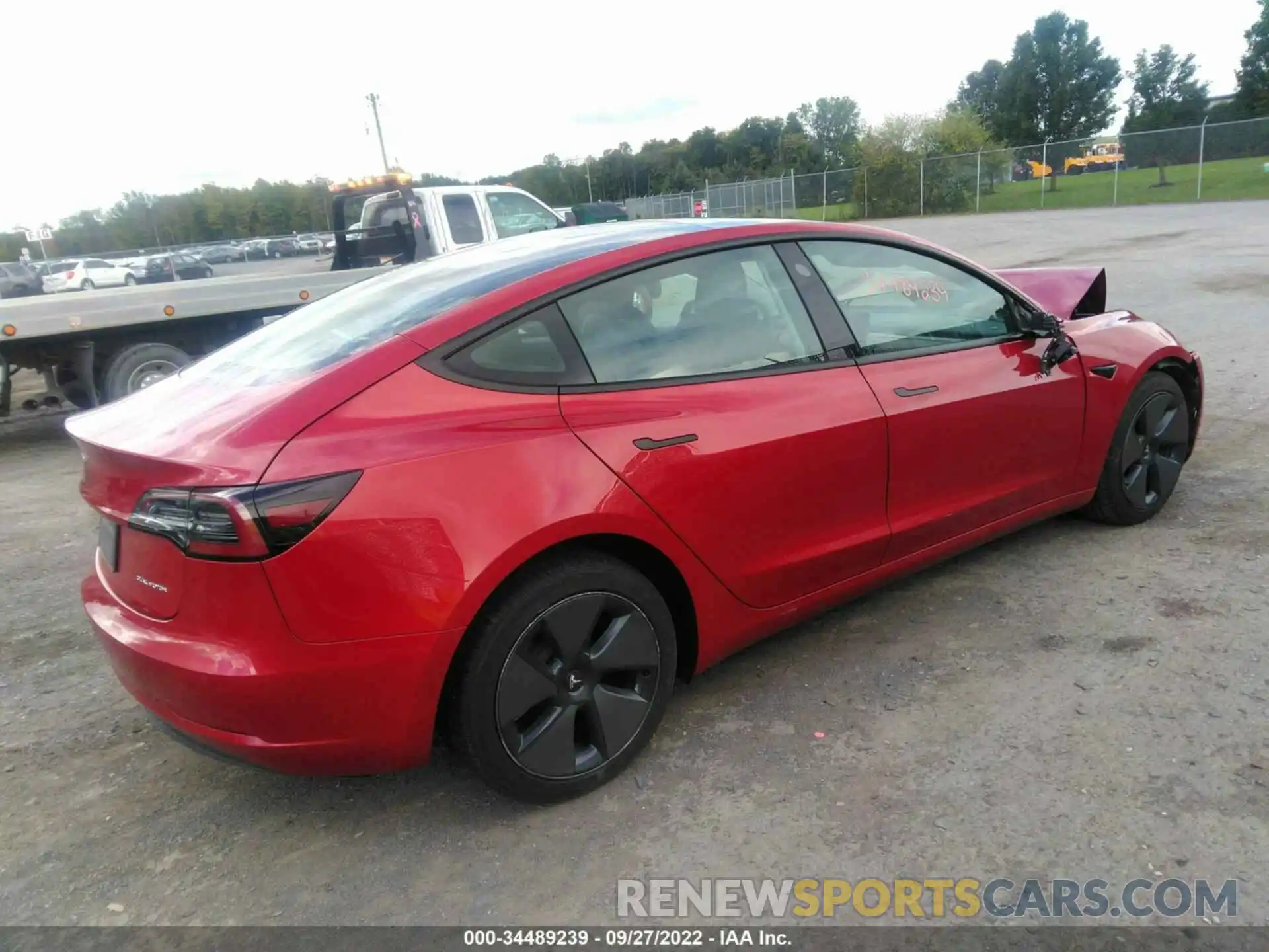 4 Photograph of a damaged car 5YJ3E1EB1MF869342 TESLA MODEL 3 2021