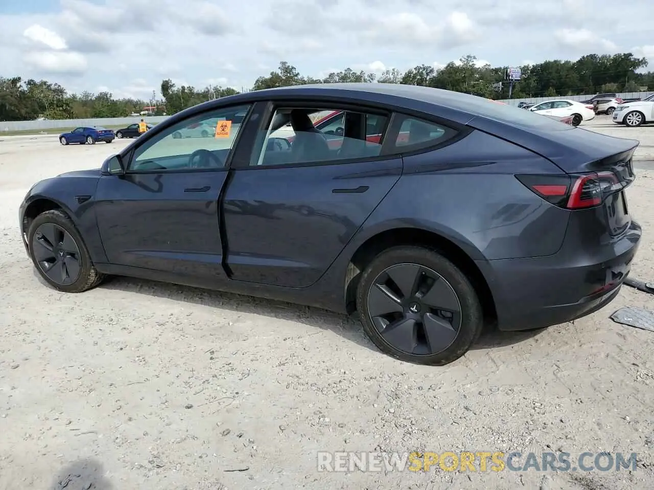 2 Photograph of a damaged car 5YJ3E1EB1MF869423 TESLA MODEL 3 2021