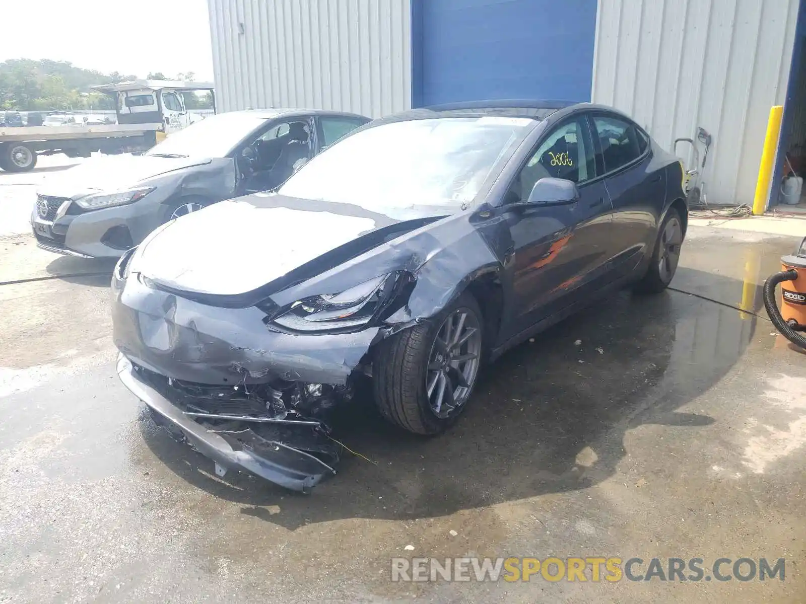 2 Photograph of a damaged car 5YJ3E1EB1MF901934 TESLA MODEL 3 2021