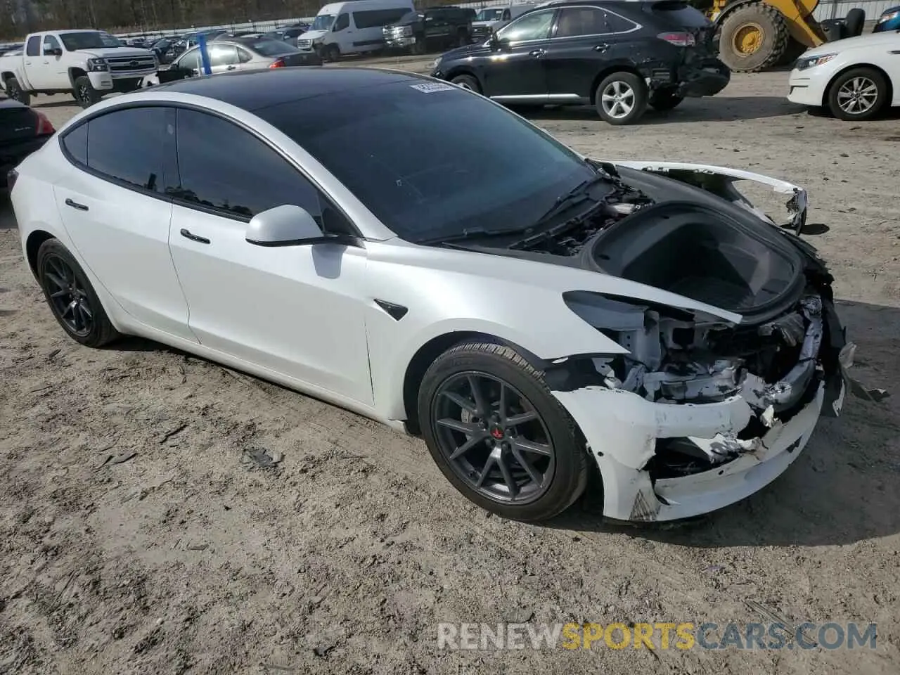 4 Photograph of a damaged car 5YJ3E1EB1MF927627 TESLA MODEL 3 2021
