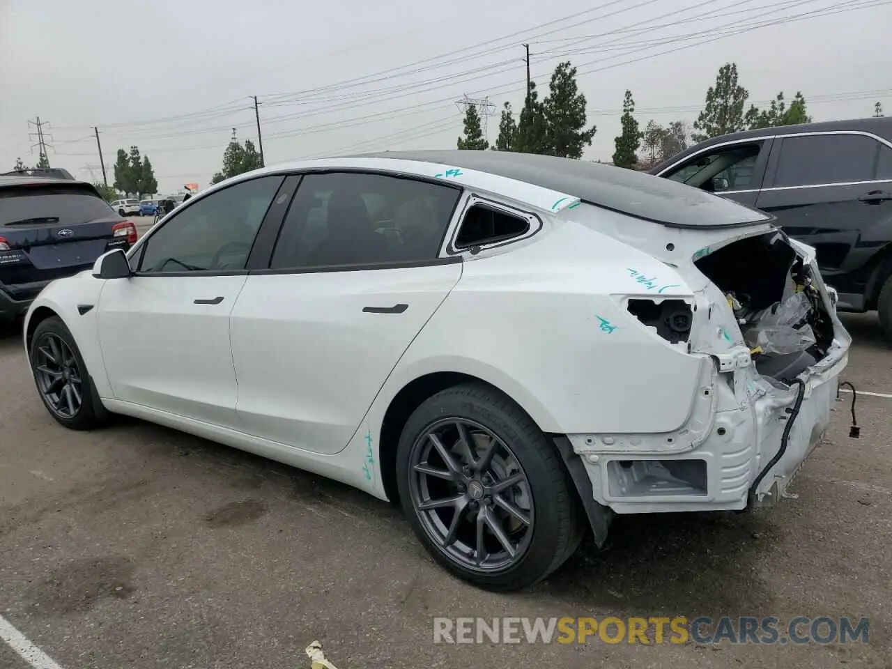 2 Photograph of a damaged car 5YJ3E1EB1MF928471 TESLA MODEL 3 2021