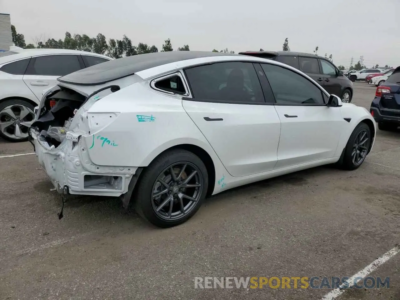 3 Photograph of a damaged car 5YJ3E1EB1MF928471 TESLA MODEL 3 2021