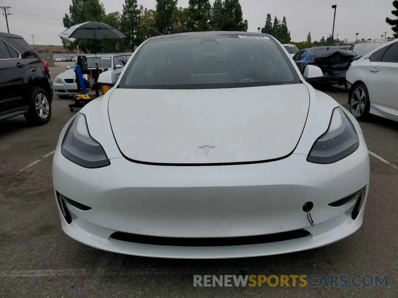 5 Photograph of a damaged car 5YJ3E1EB1MF928471 TESLA MODEL 3 2021
