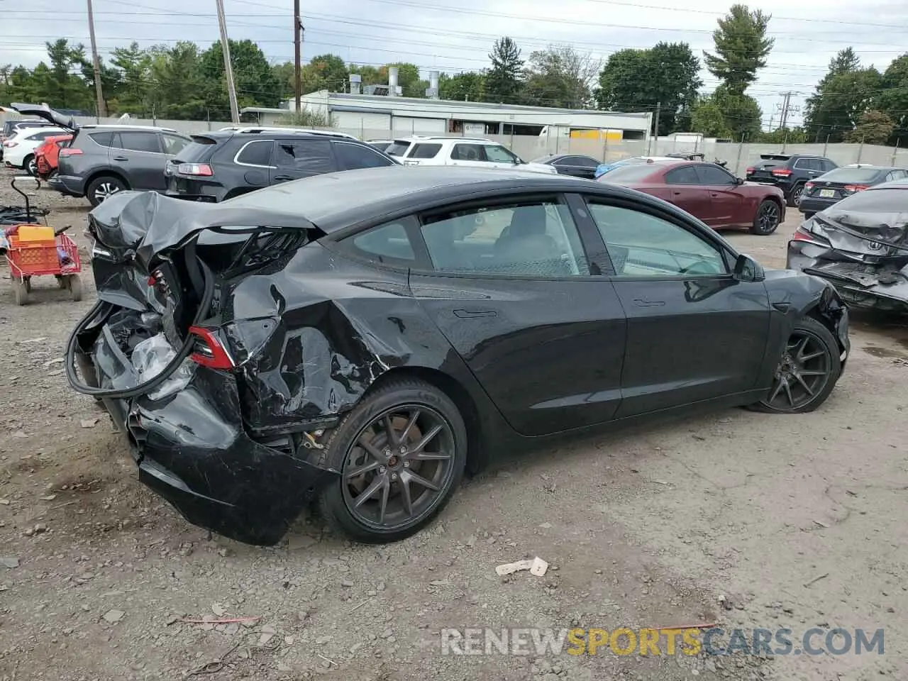 3 Photograph of a damaged car 5YJ3E1EB1MF973863 TESLA MODEL 3 2021