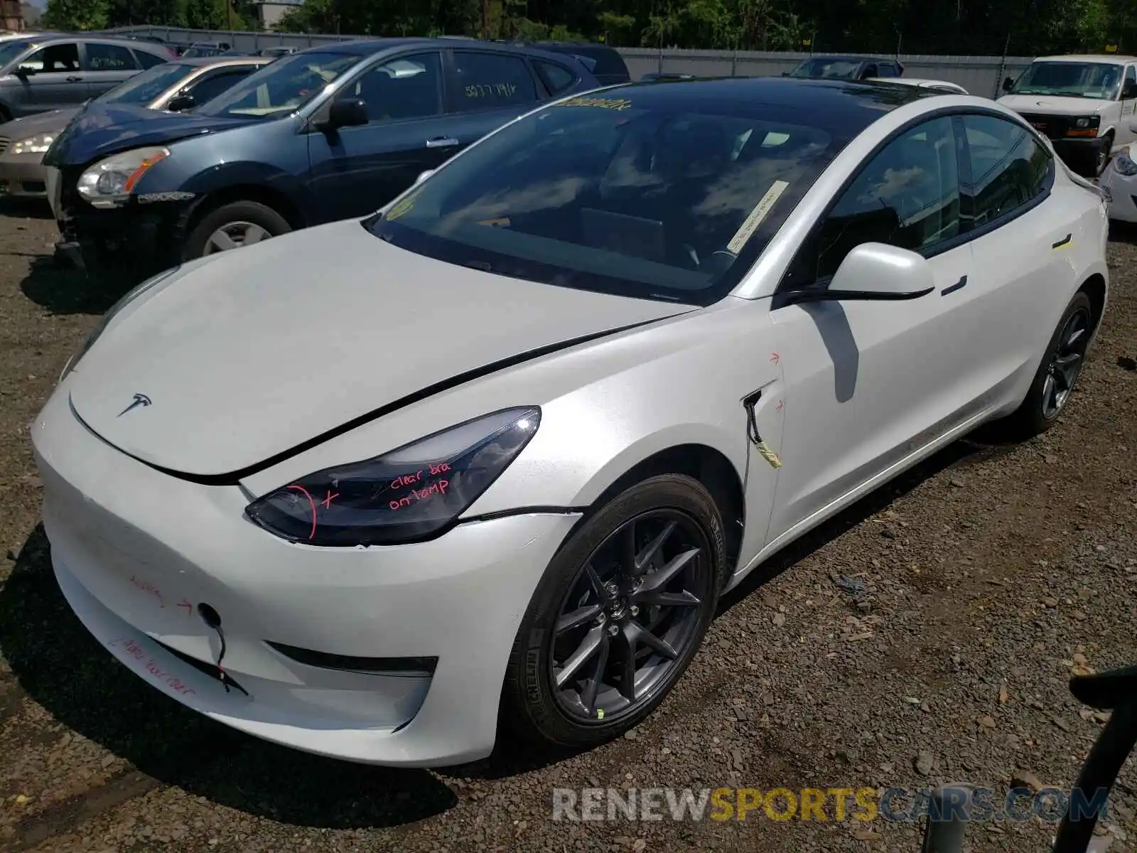 2 Photograph of a damaged car 5YJ3E1EB1MF978996 TESLA MODEL 3 2021