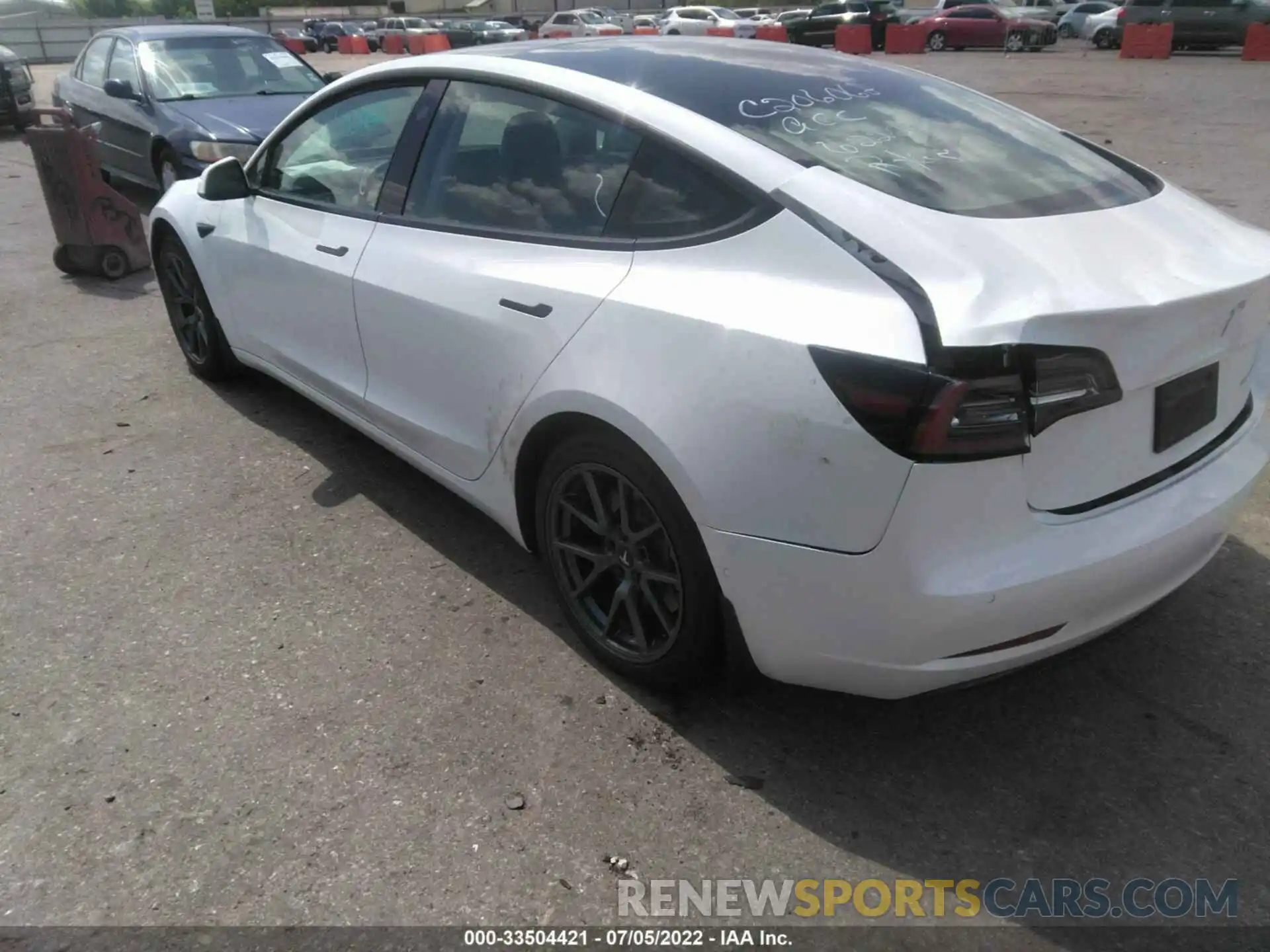 3 Photograph of a damaged car 5YJ3E1EB1MF979386 TESLA MODEL 3 2021