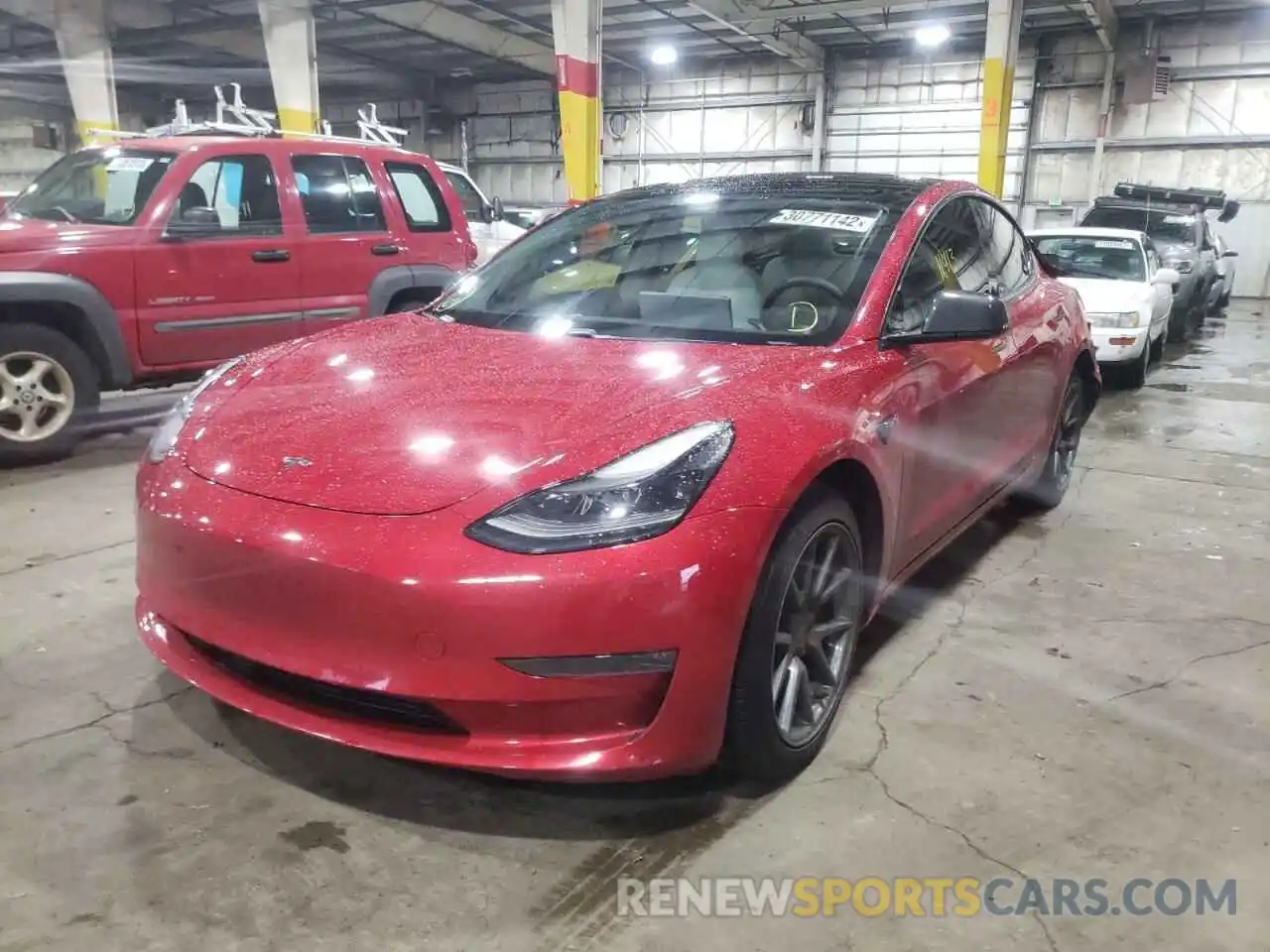 2 Photograph of a damaged car 5YJ3E1EB1MF981297 TESLA MODEL 3 2021