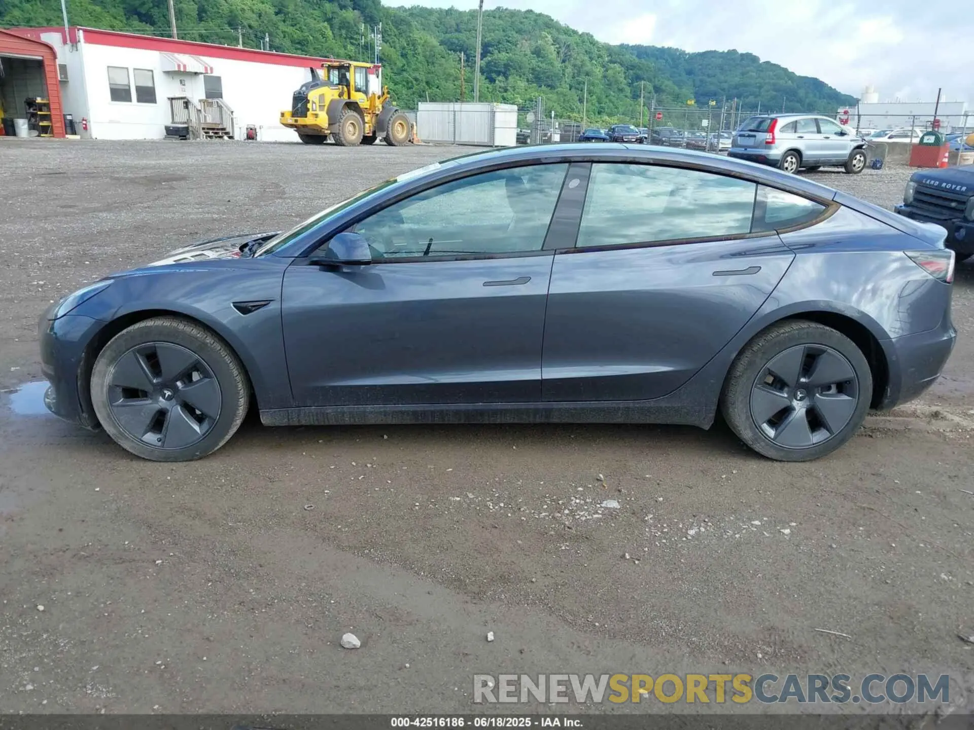 14 Photograph of a damaged car 5YJ3E1EB1MF983986 TESLA MODEL 3 2021