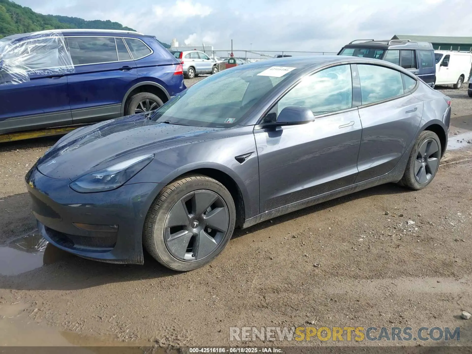 2 Photograph of a damaged car 5YJ3E1EB1MF983986 TESLA MODEL 3 2021
