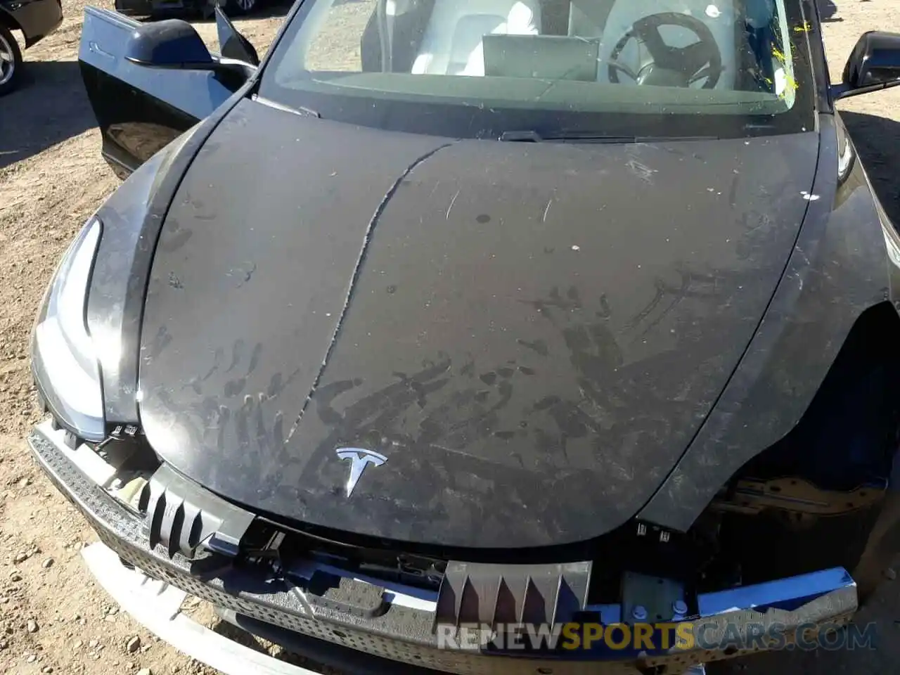 7 Photograph of a damaged car 5YJ3E1EB1MF999704 TESLA MODEL 3 2021